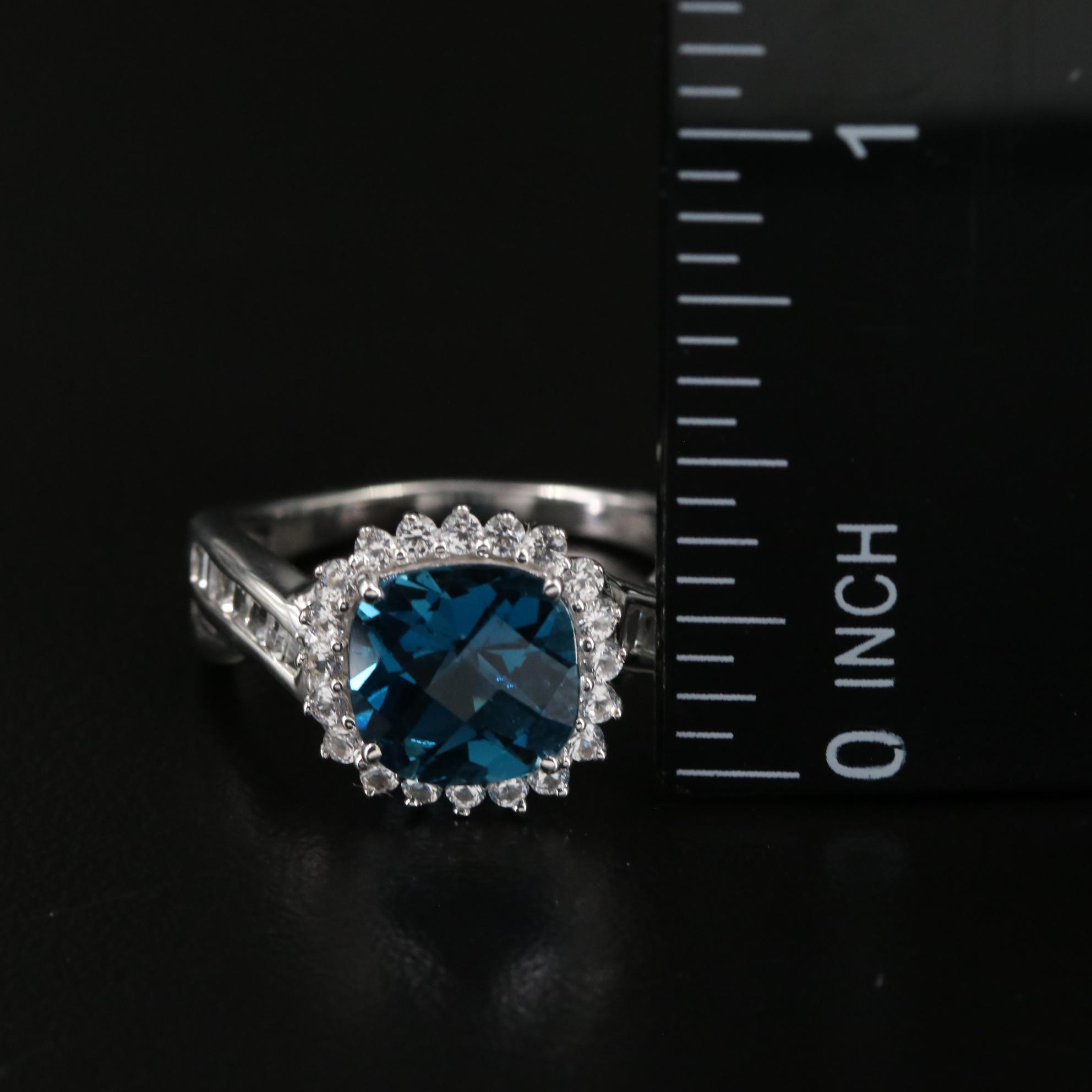 Sterling Blue Topaz and White Sapphire Crossover Ring