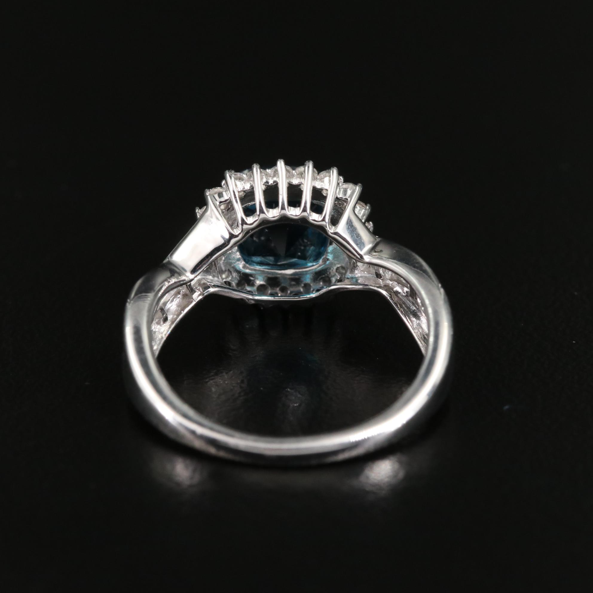 Sterling Blue Topaz and White Sapphire Crossover Ring