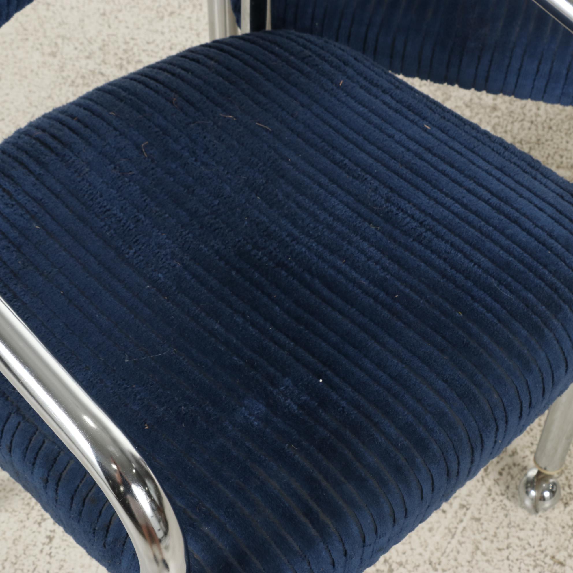 Four Tubular Chromed Metal Upholstered Rolling Armchairs, attr. to Chromcraft