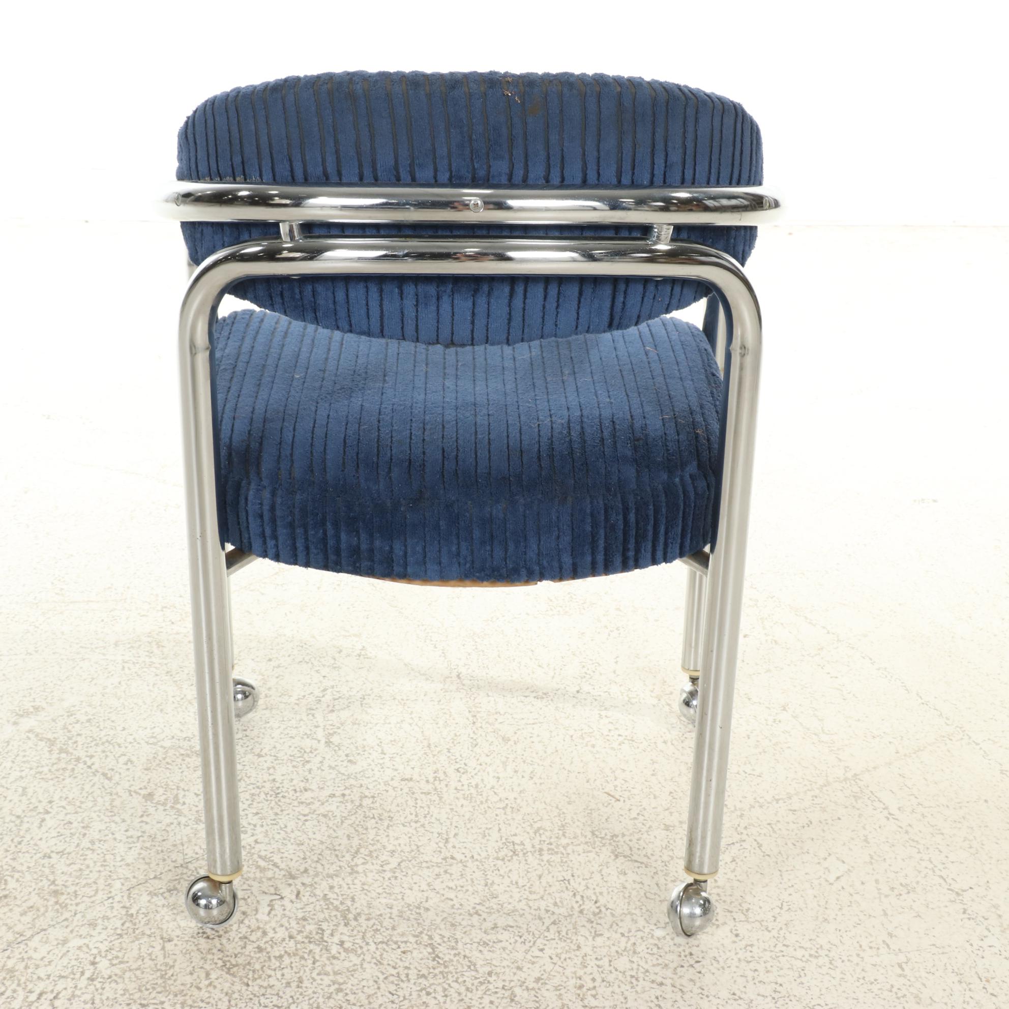 Four Tubular Chromed Metal Upholstered Rolling Armchairs, attr. to Chromcraft
