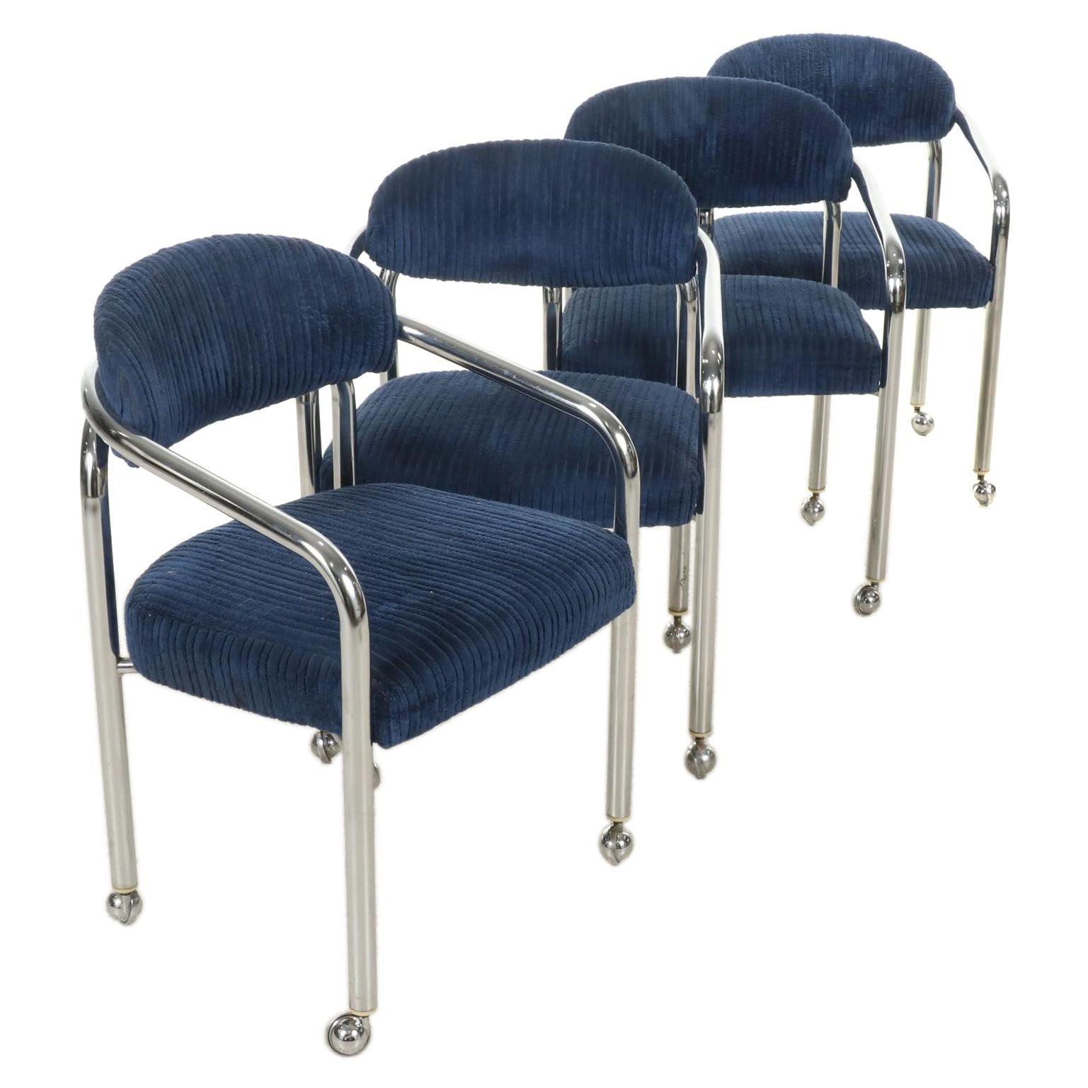 Four Tubular Chromed Metal Upholstered Rolling Armchairs, attr. to Chromcraft
