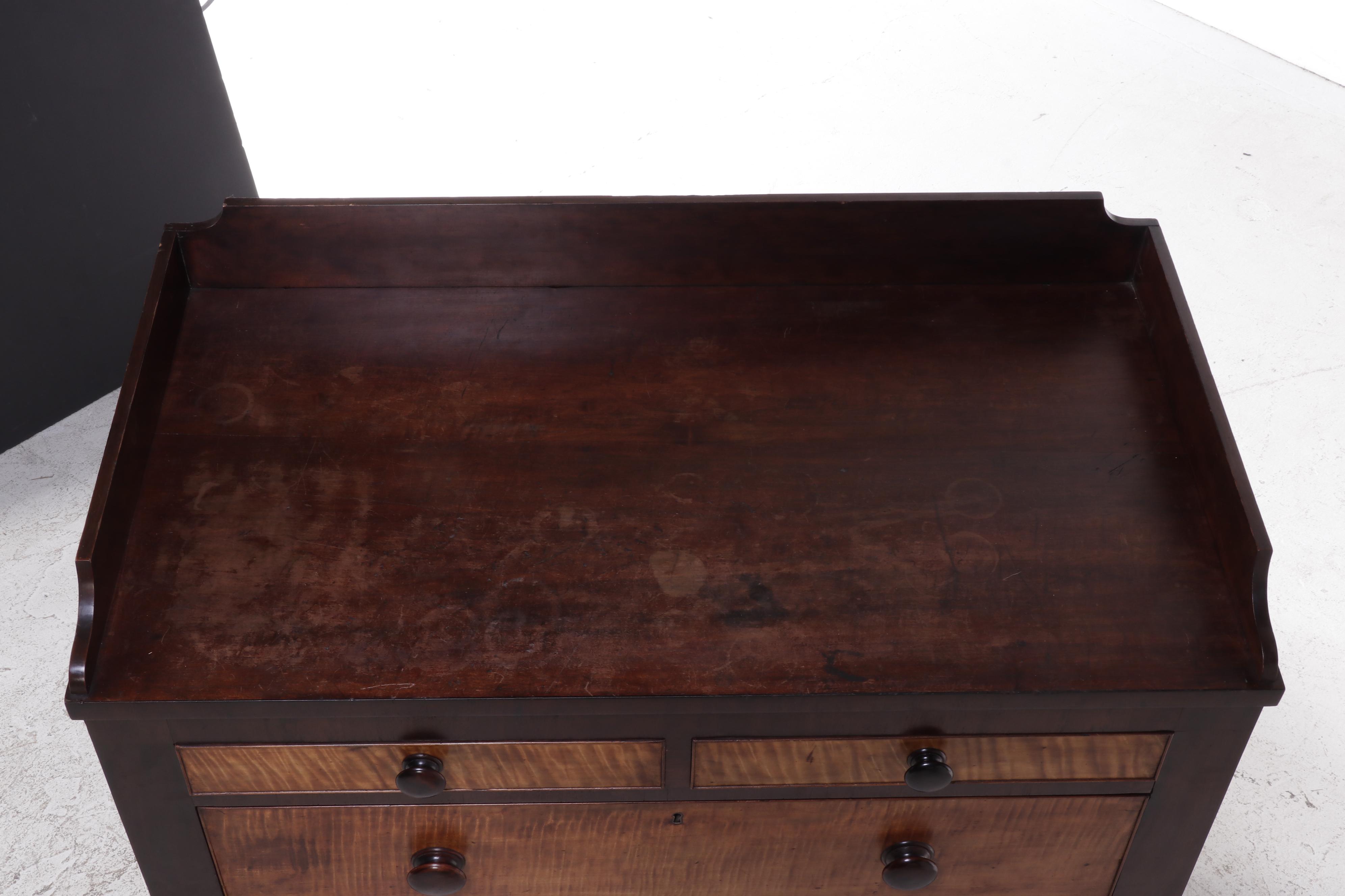 Late Federal Mahogany and Curly Maple Chest of Drawers