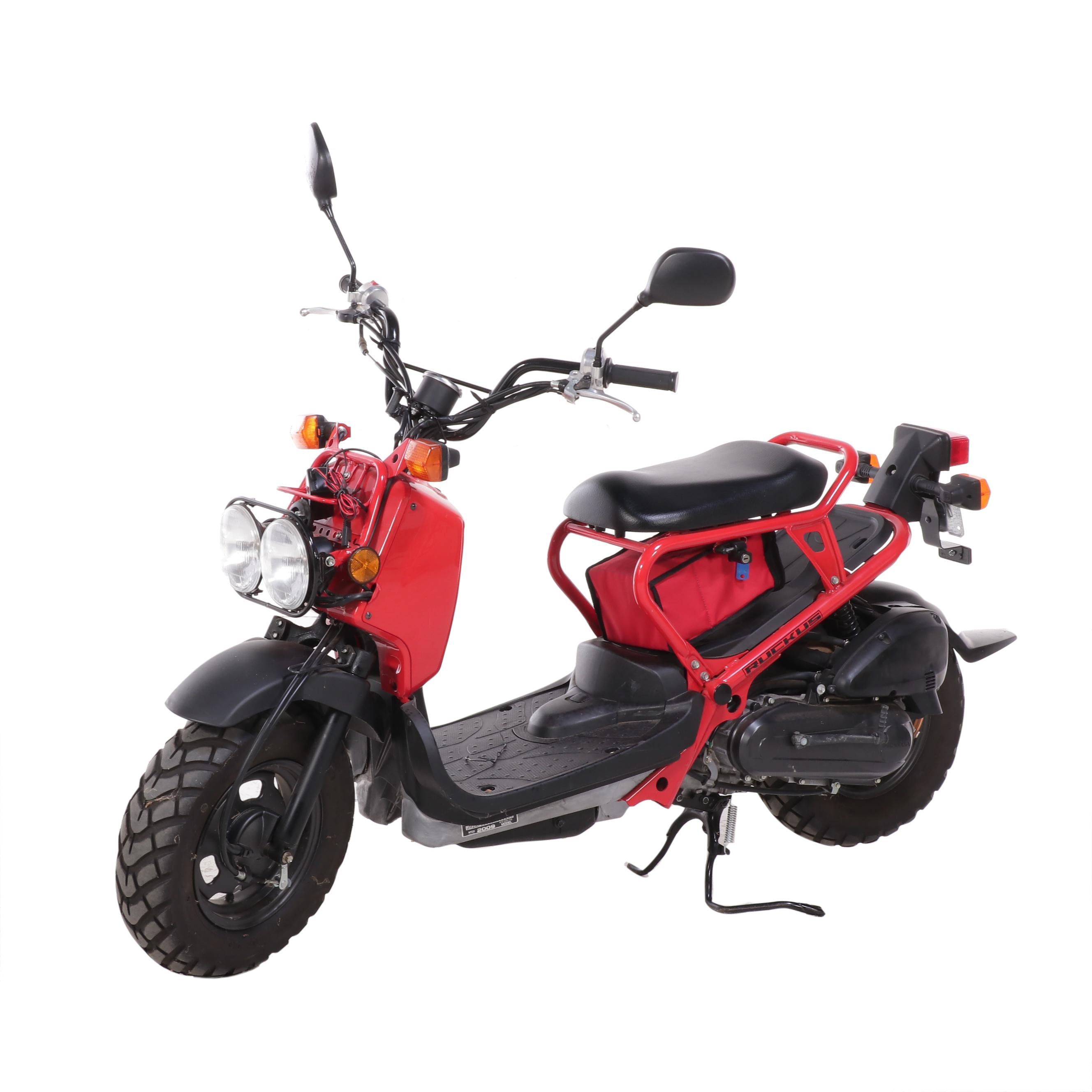 2009 Honda Ruckus Scooter in Red with with HJC Half-Shell Helmets