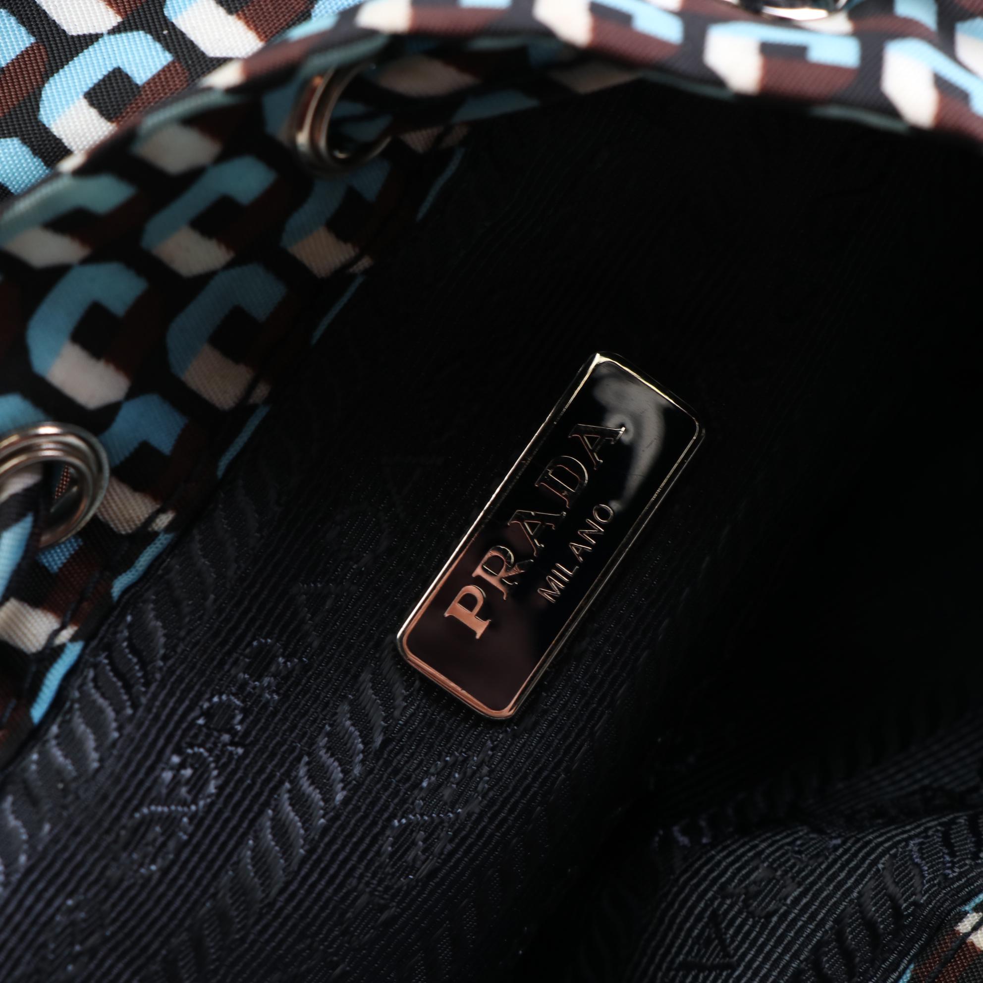 Prada Mini Drawstring Bag in Printed Nylon with Saffiano Leather Trim