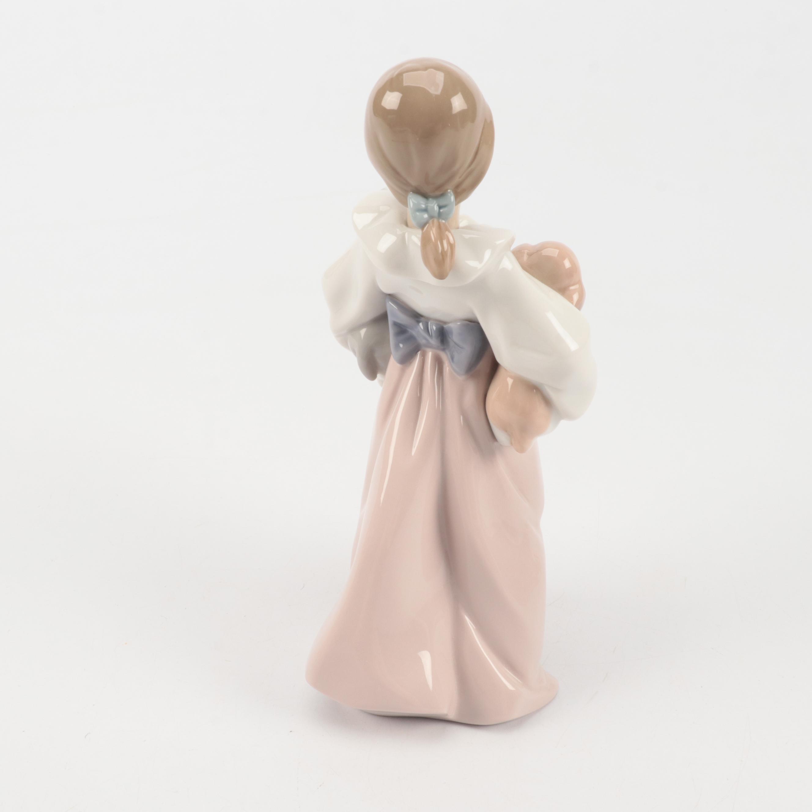 Lladró "Arms Full of Love" Porcelain Figurine Designed by Francisco Polope