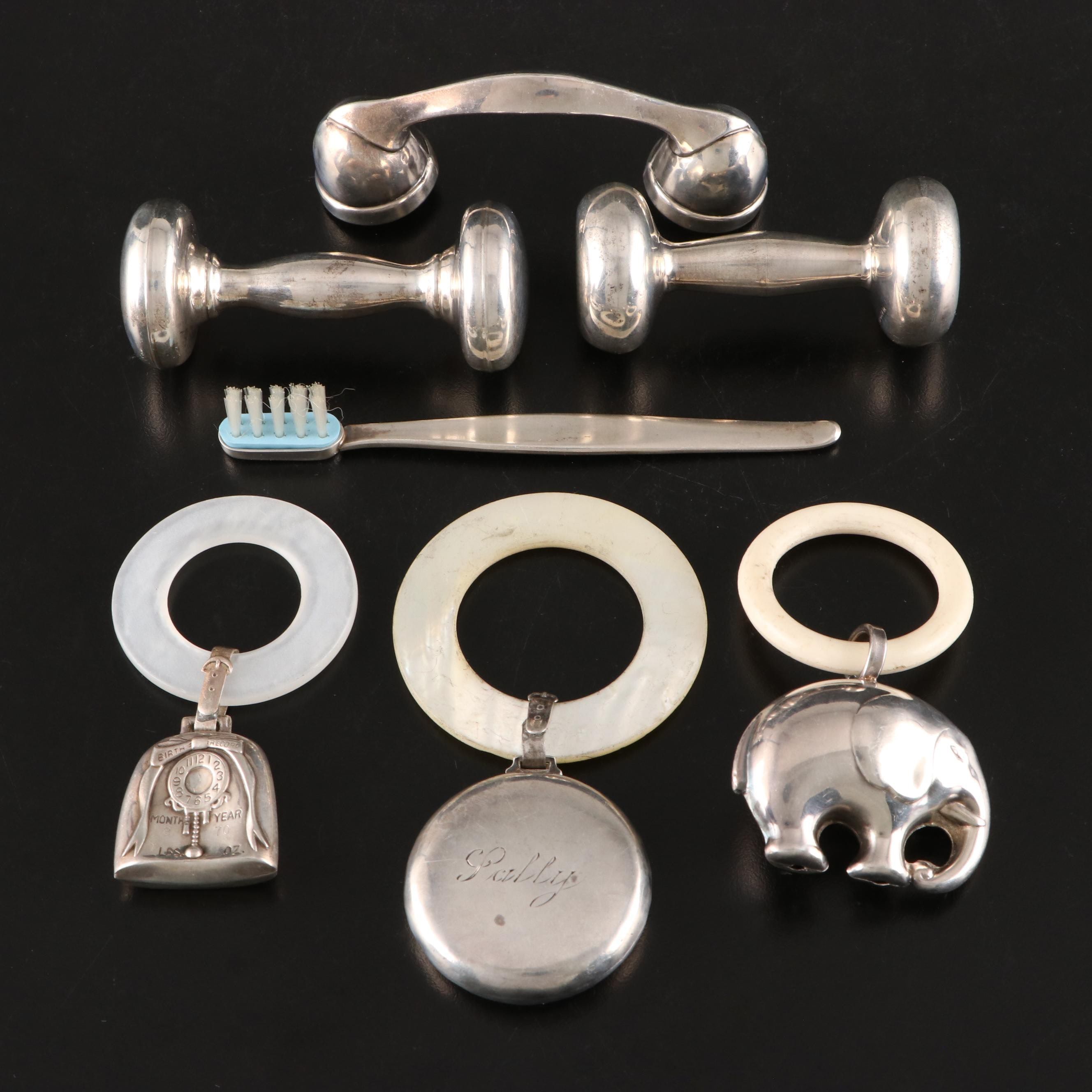 Tiffany & Co. and Other Sterling Silver Baby Rattles and Silver Keepsakes