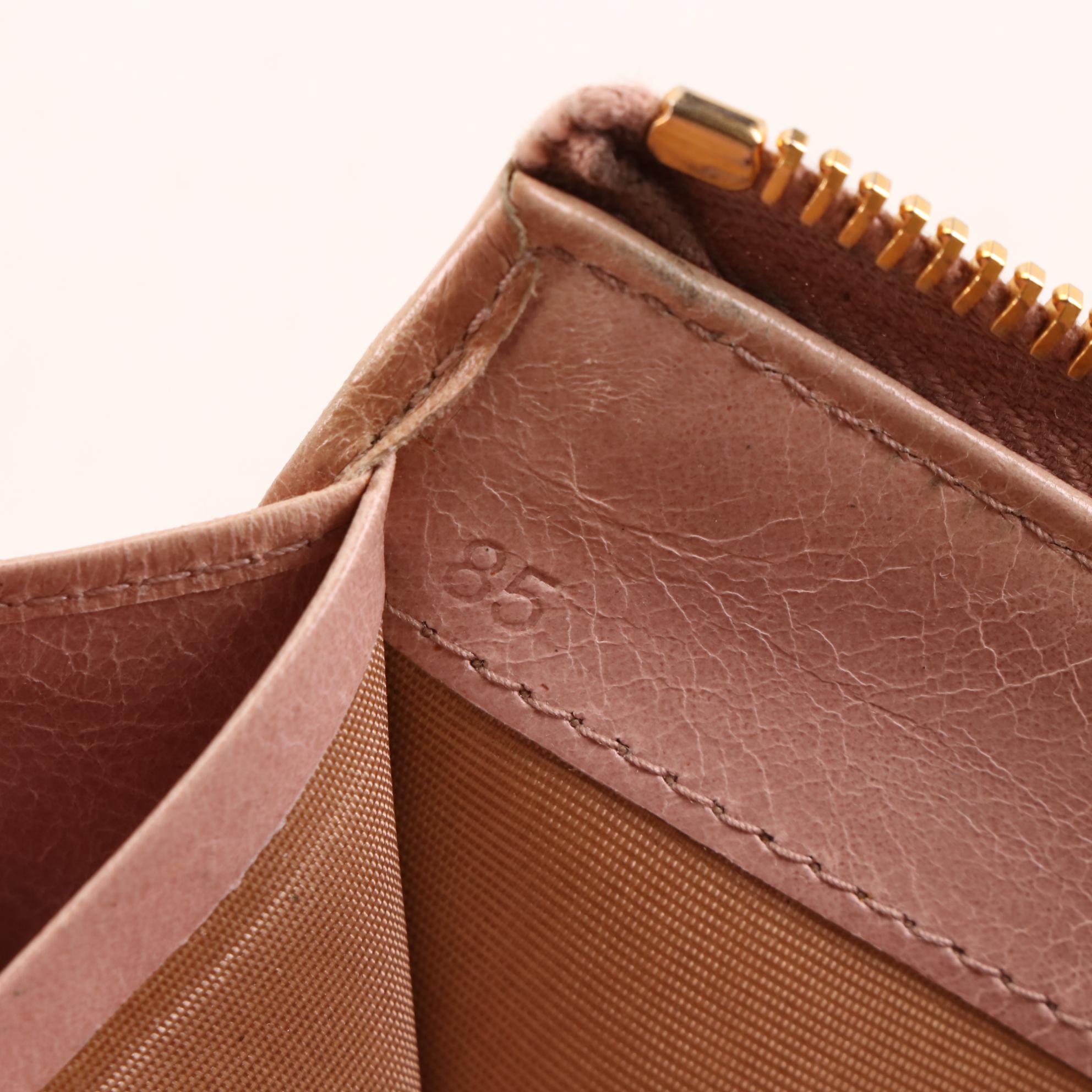 Prada Quilted Leather Zip-Around Wallet