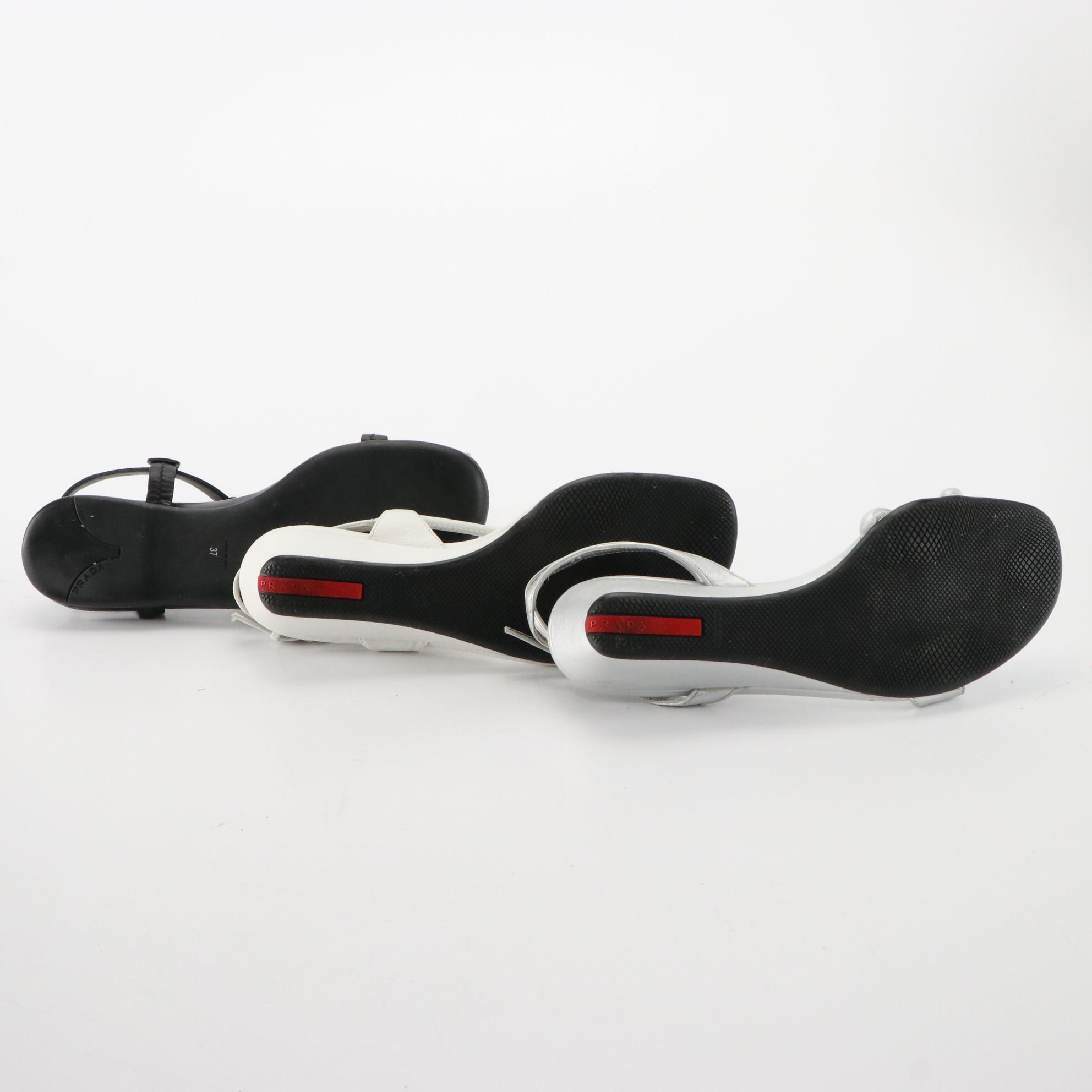 Prada White and Silver Wedge Sandals with Black Flat Sandals