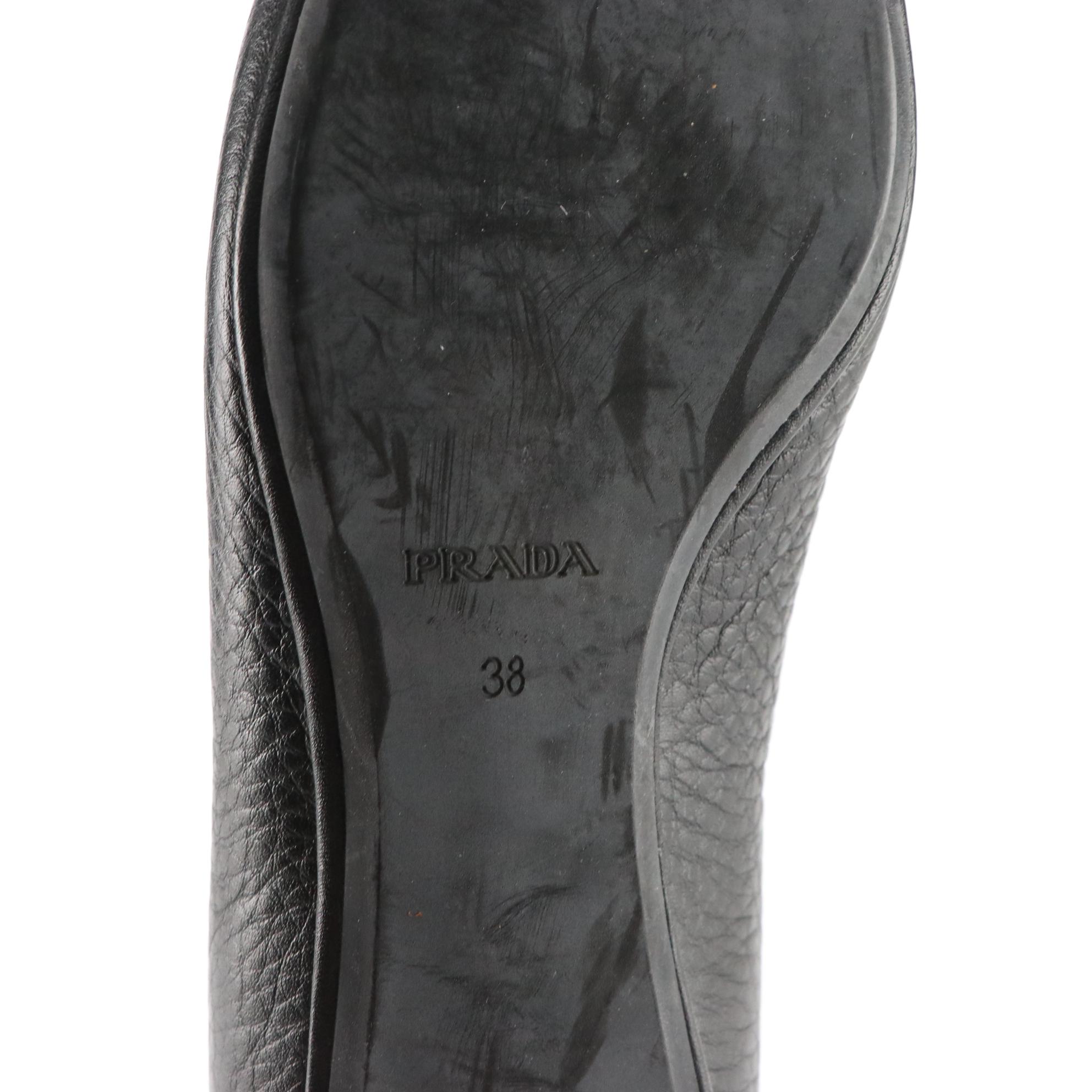 Prada Pointed Toe Loafers in Black Grained Leather with Logo Plaque