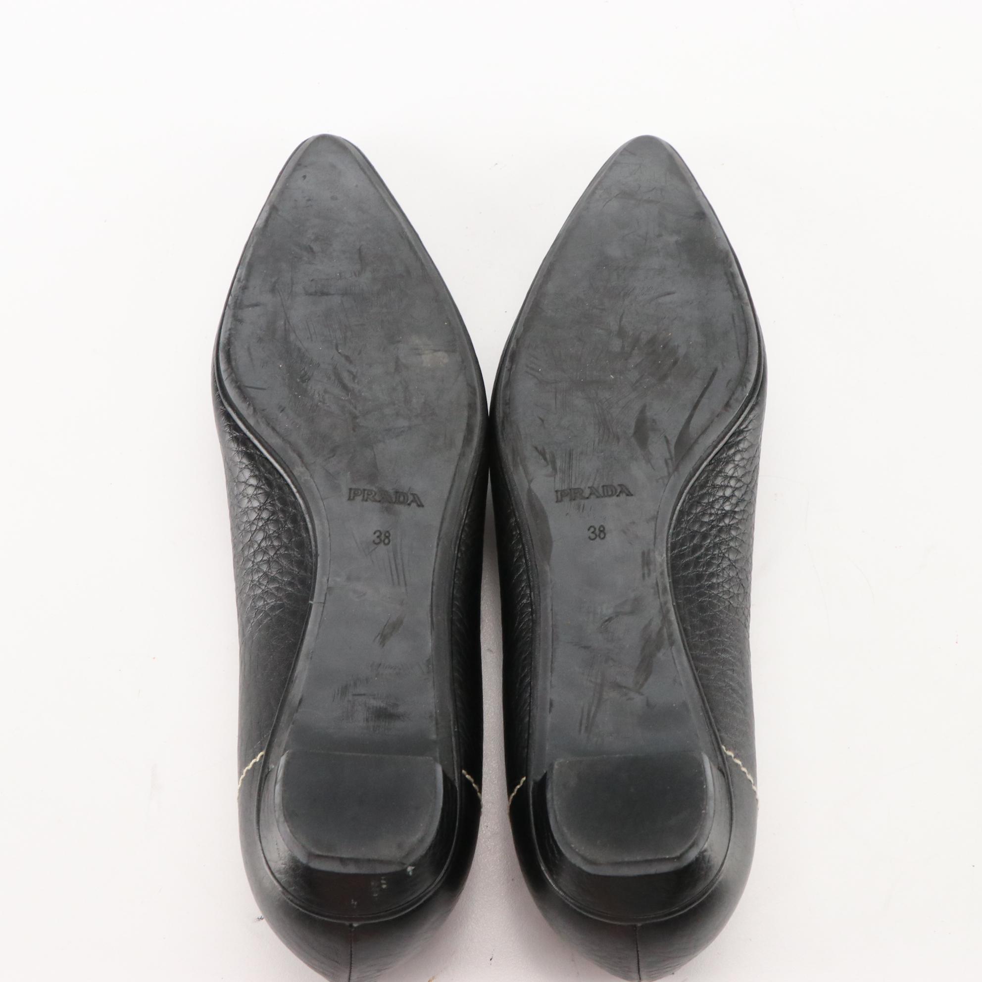 Prada Pointed Toe Loafers in Black Grained Leather with Logo Plaque