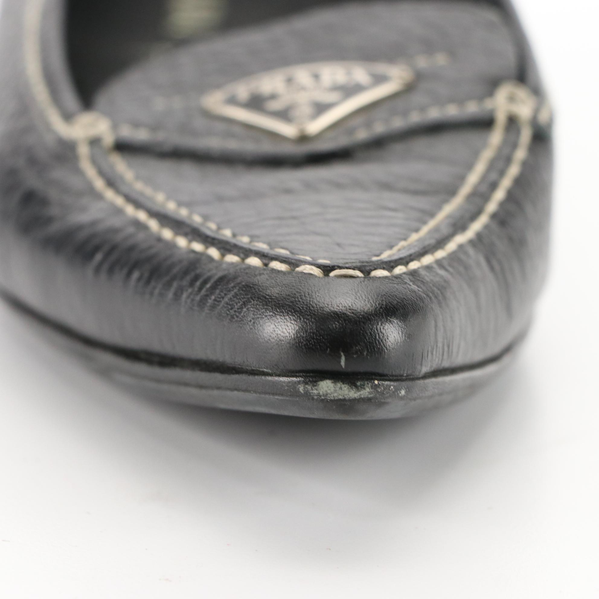 Prada Pointed Toe Loafers in Black Grained Leather with Logo Plaque