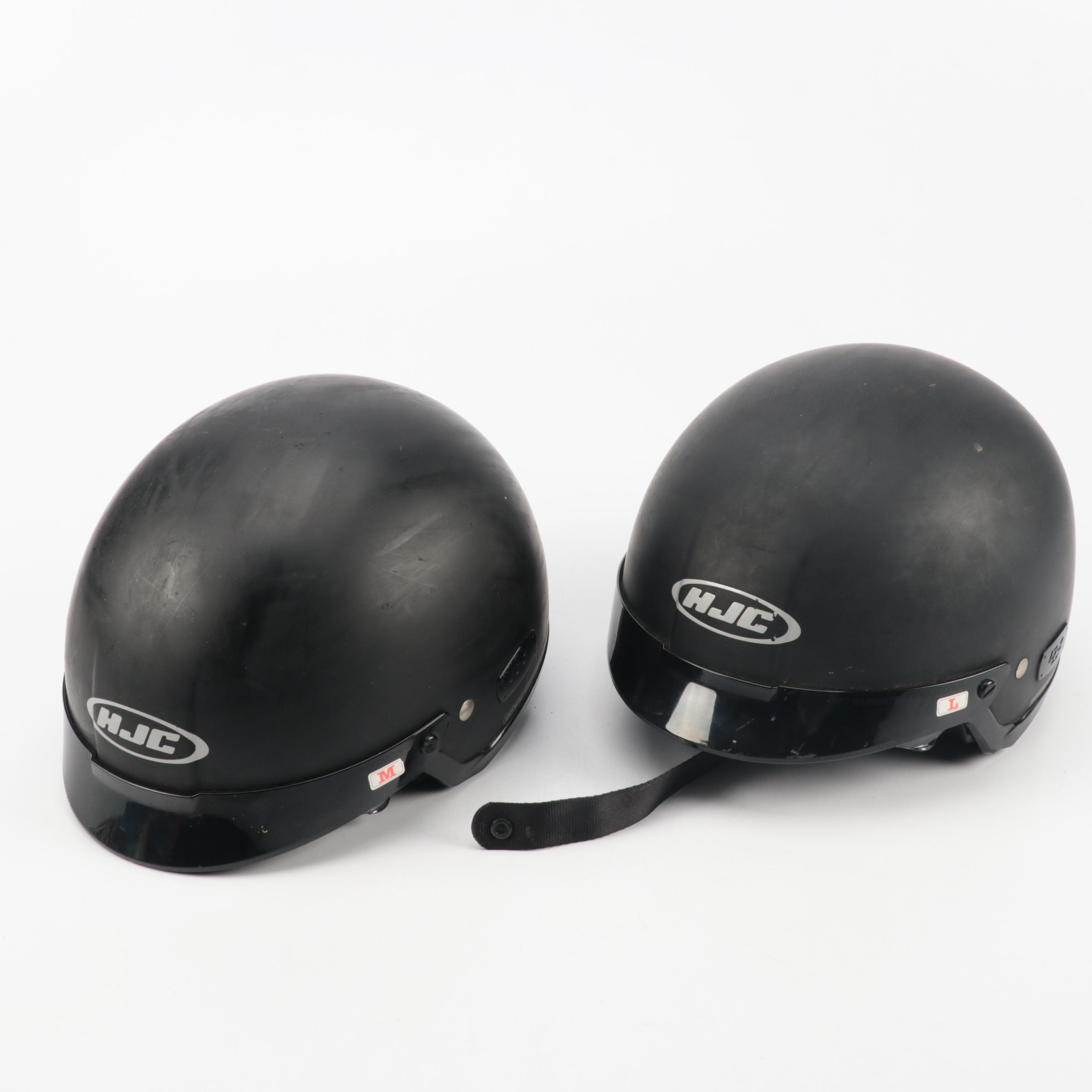 2009 Honda Ruckus Scooter in Red with HJC Half-Shell Helmets