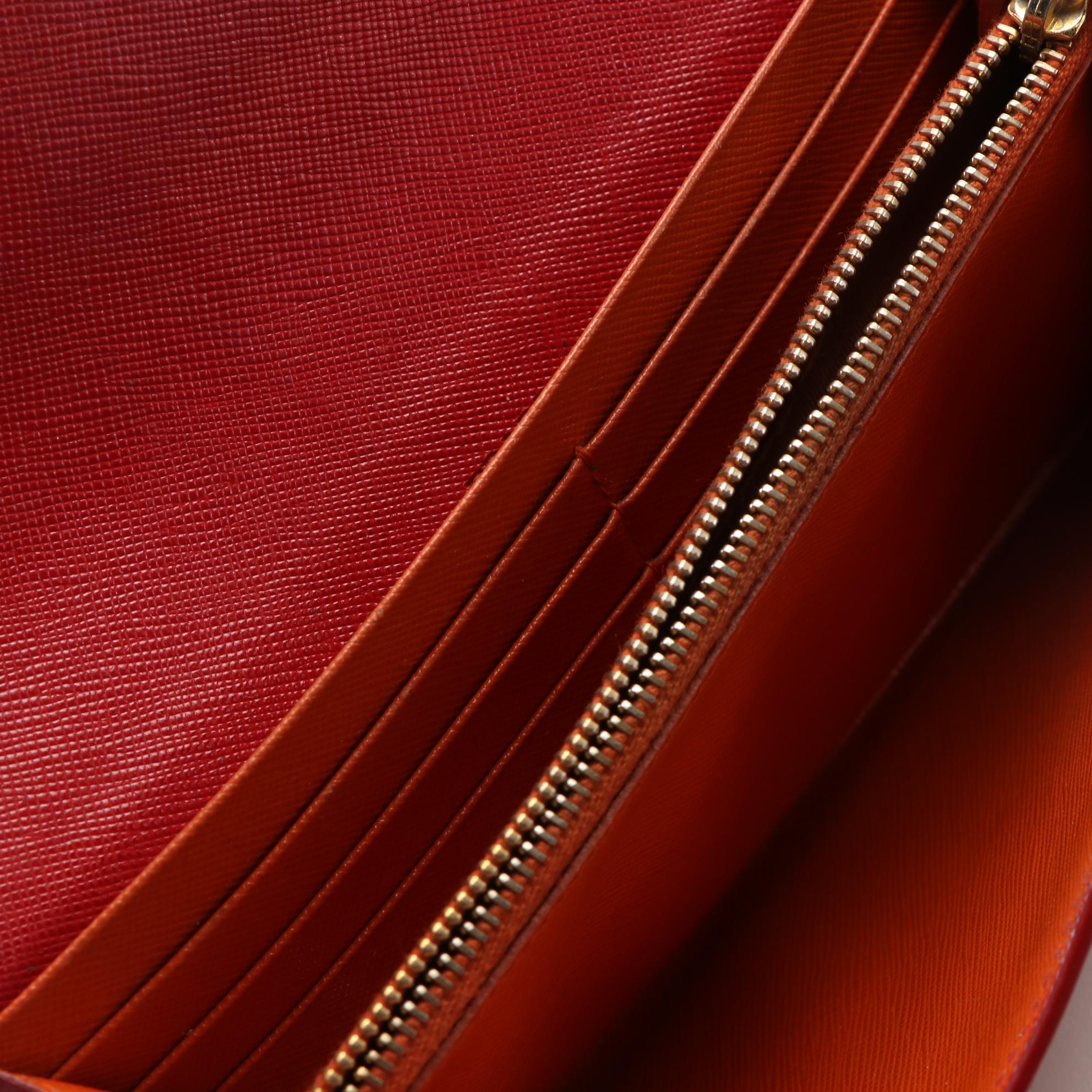 Prada Front Flap Long Wallet in Red and Orange Saffiano Wave Leather
