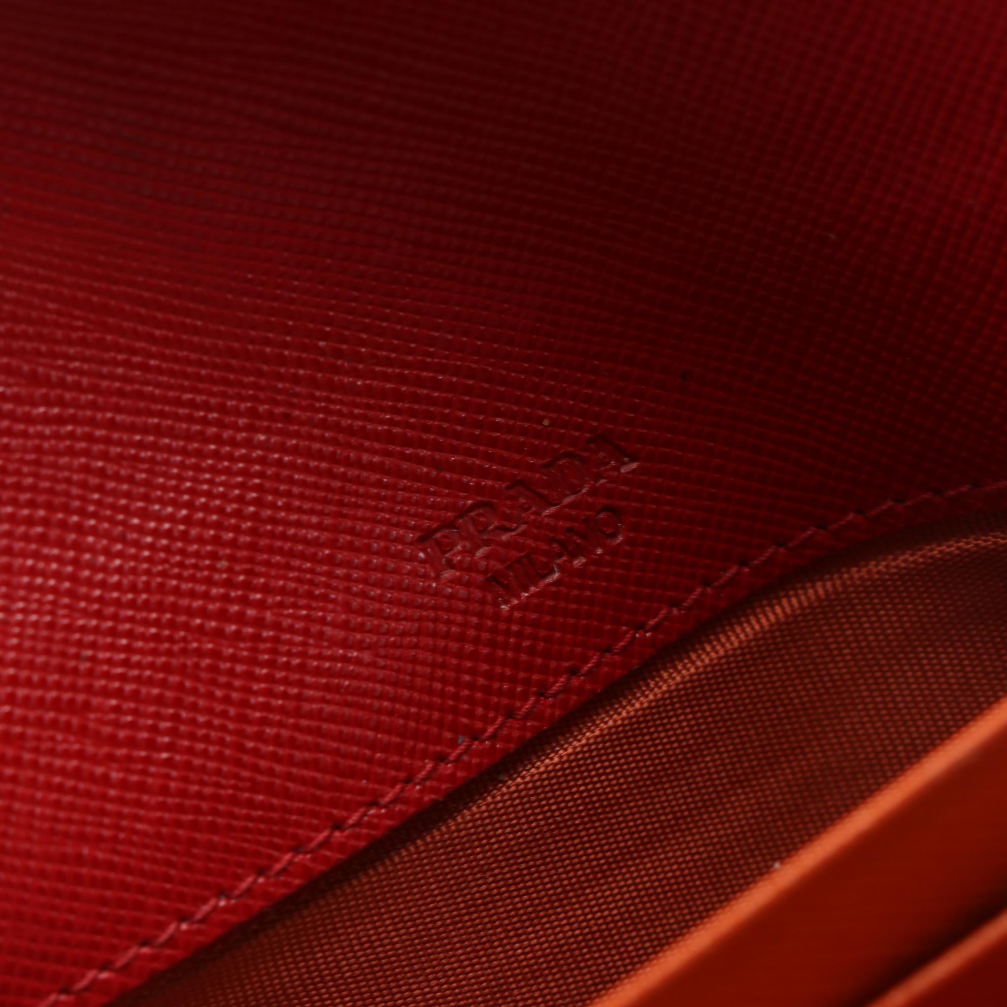 Prada Front Flap Long Wallet in Red and Orange Saffiano Wave Leather