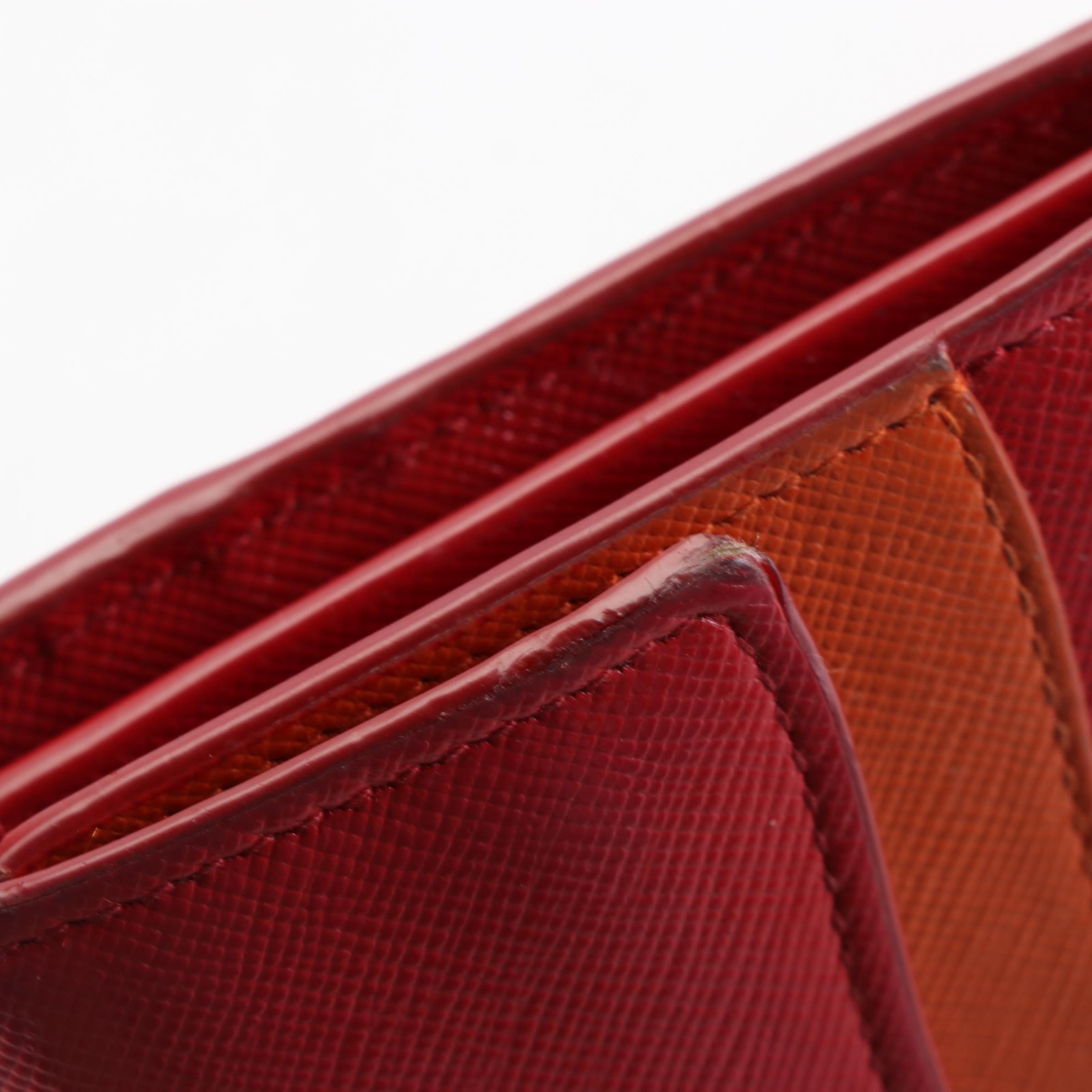 Prada Front Flap Long Wallet in Red and Orange Saffiano Wave Leather