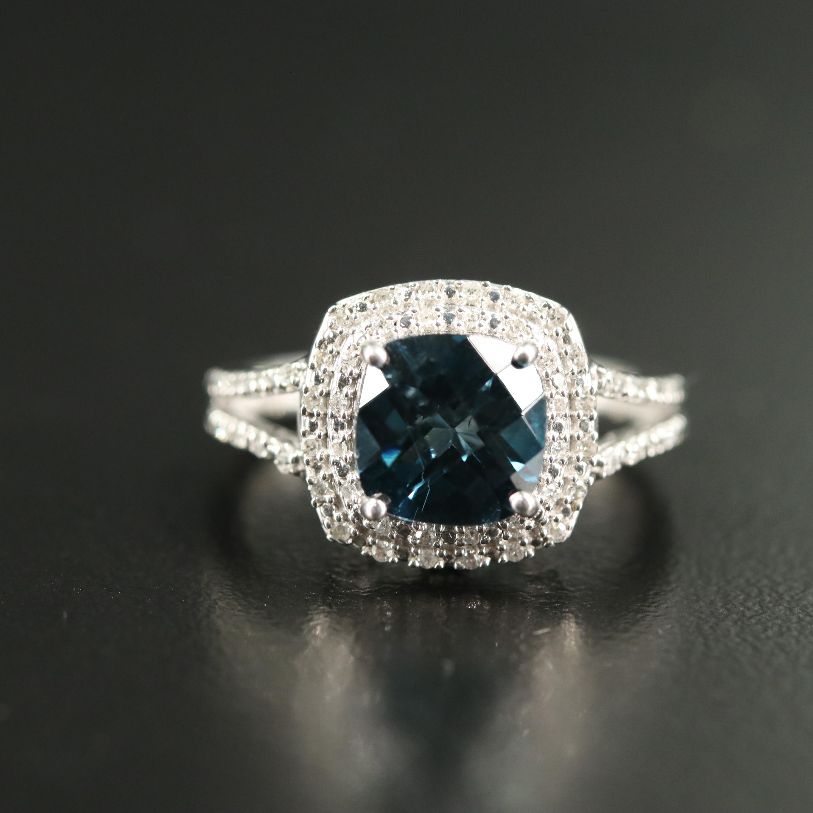 Sterling Blue Topaz and Diamond Halo Ring