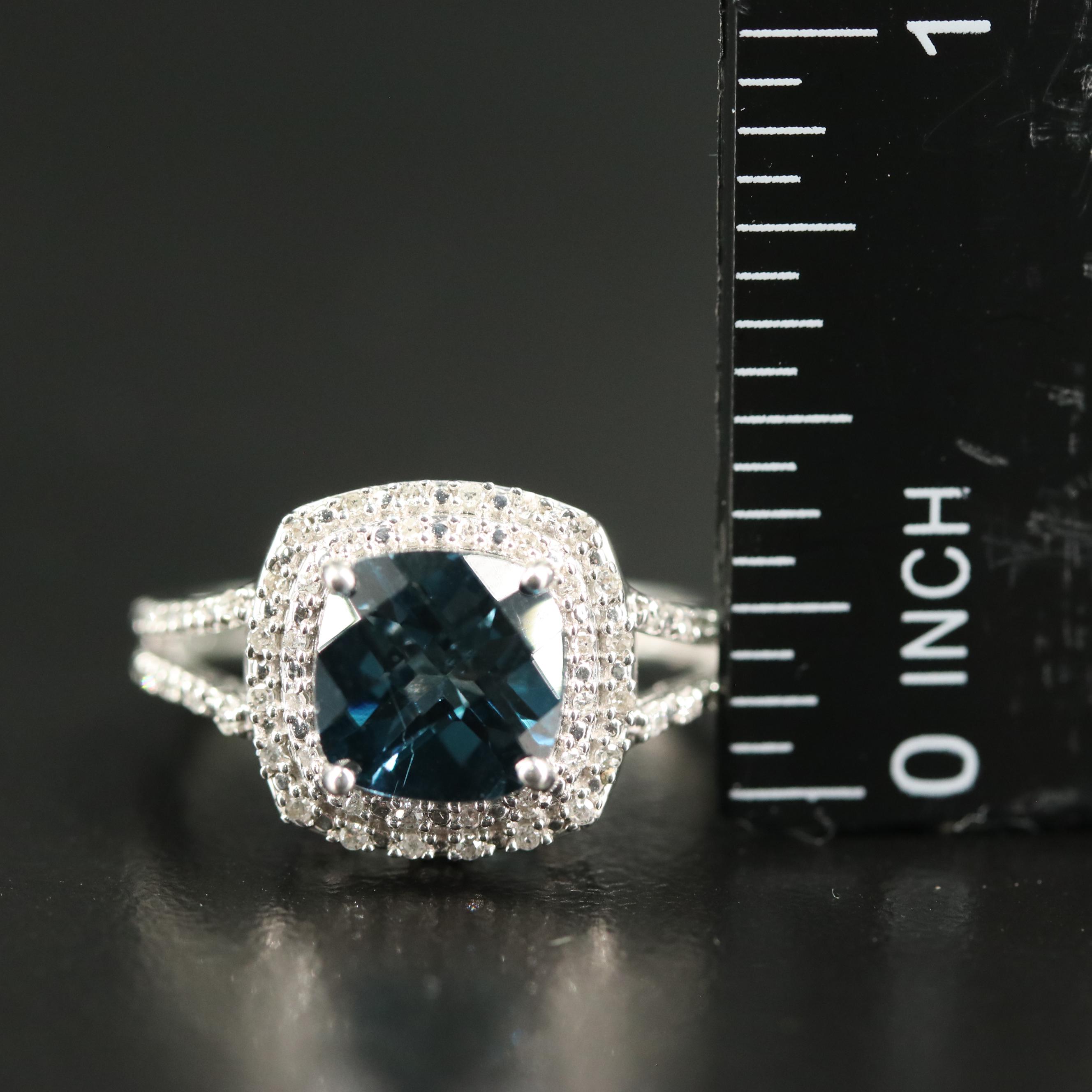 Sterling Blue Topaz and Diamond Halo Ring
