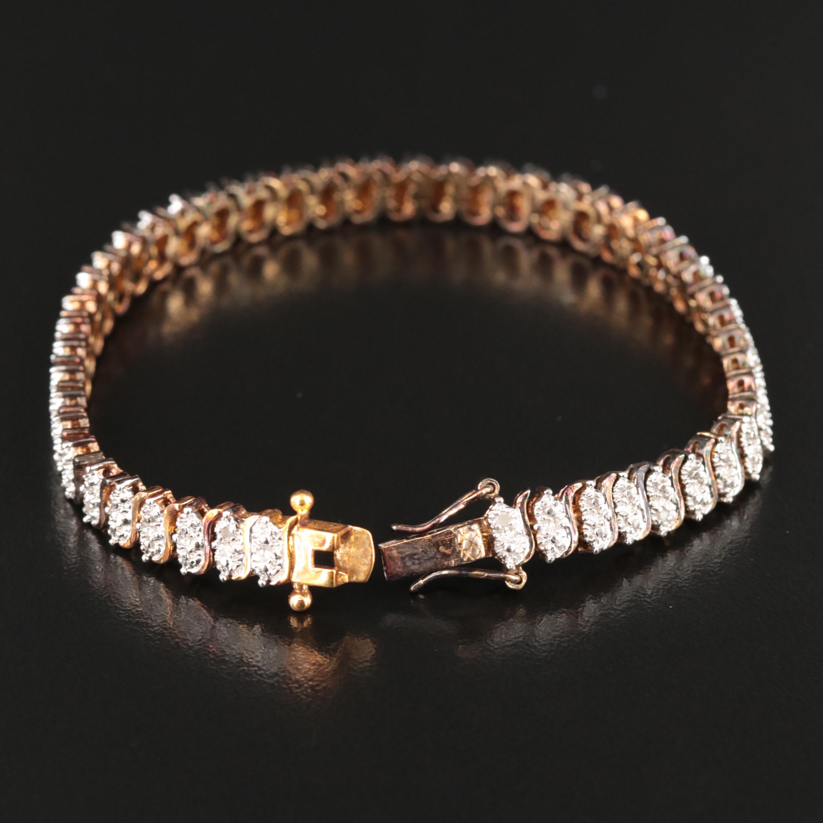 Sterling Bracelet with Diamond Accents Featured in Jewelry Assortment