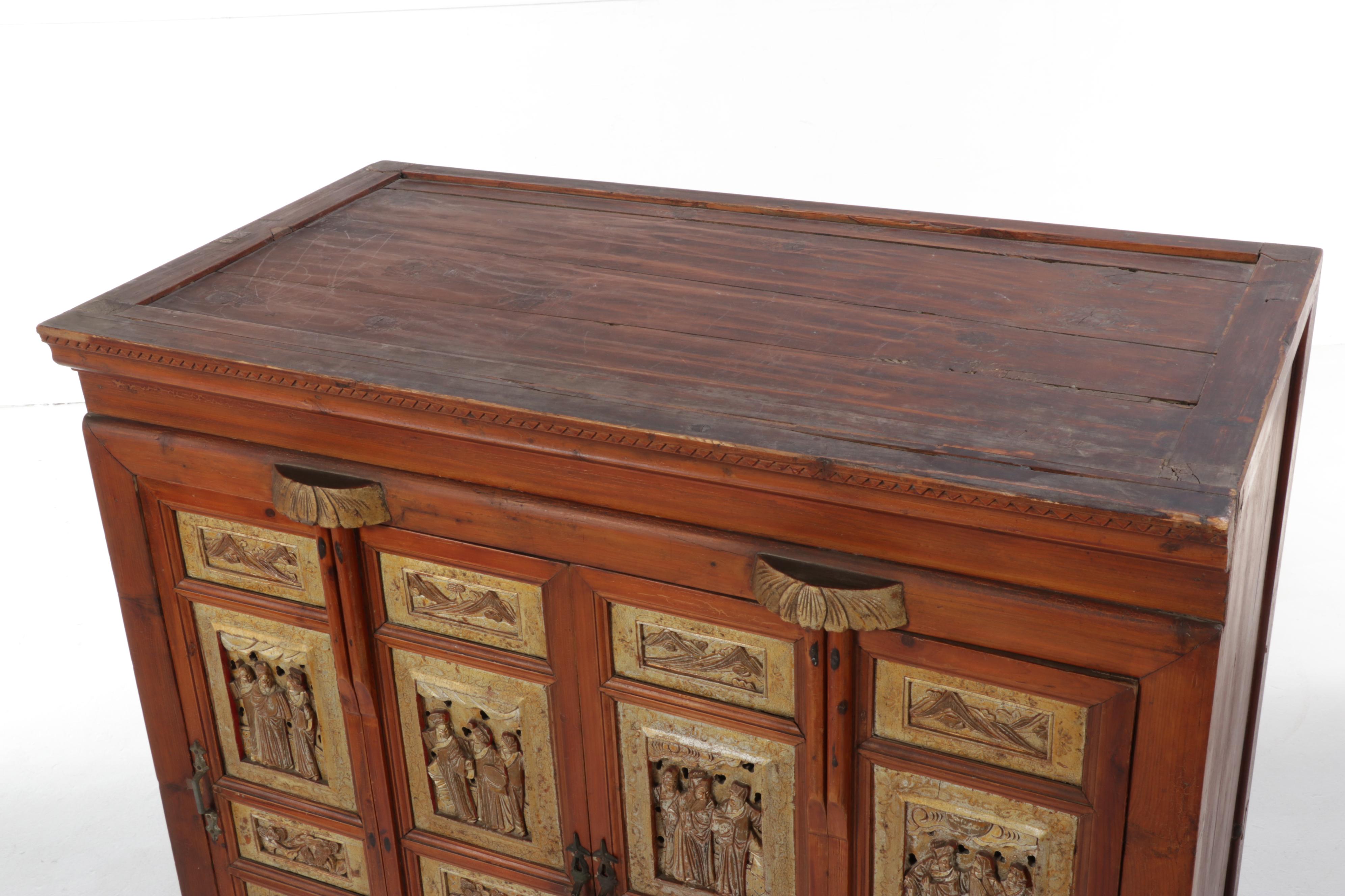 Chinese Two-Piece Lacquered, Carved and Gilt Cabinet