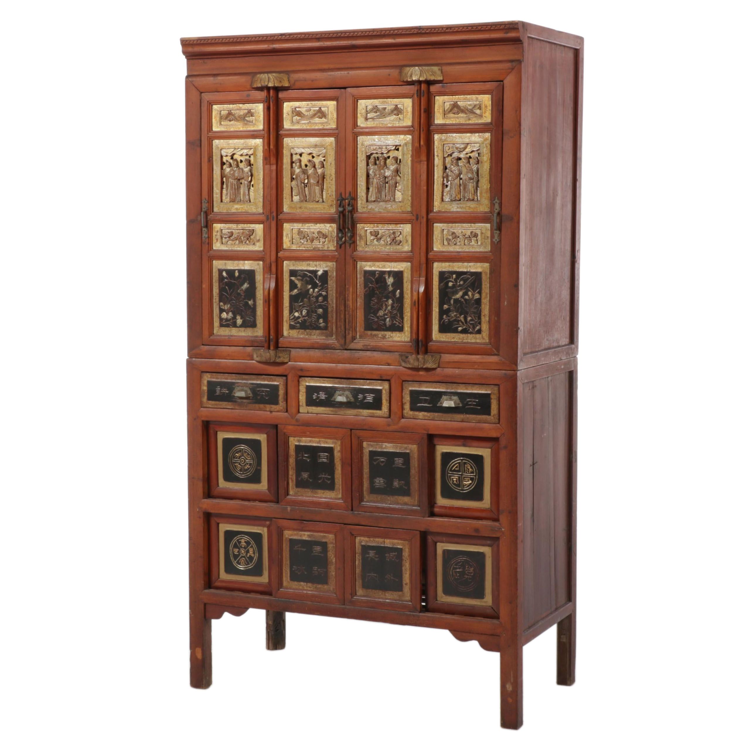 Chinese Two-Piece Lacquered, Carved and Gilt Cabinet