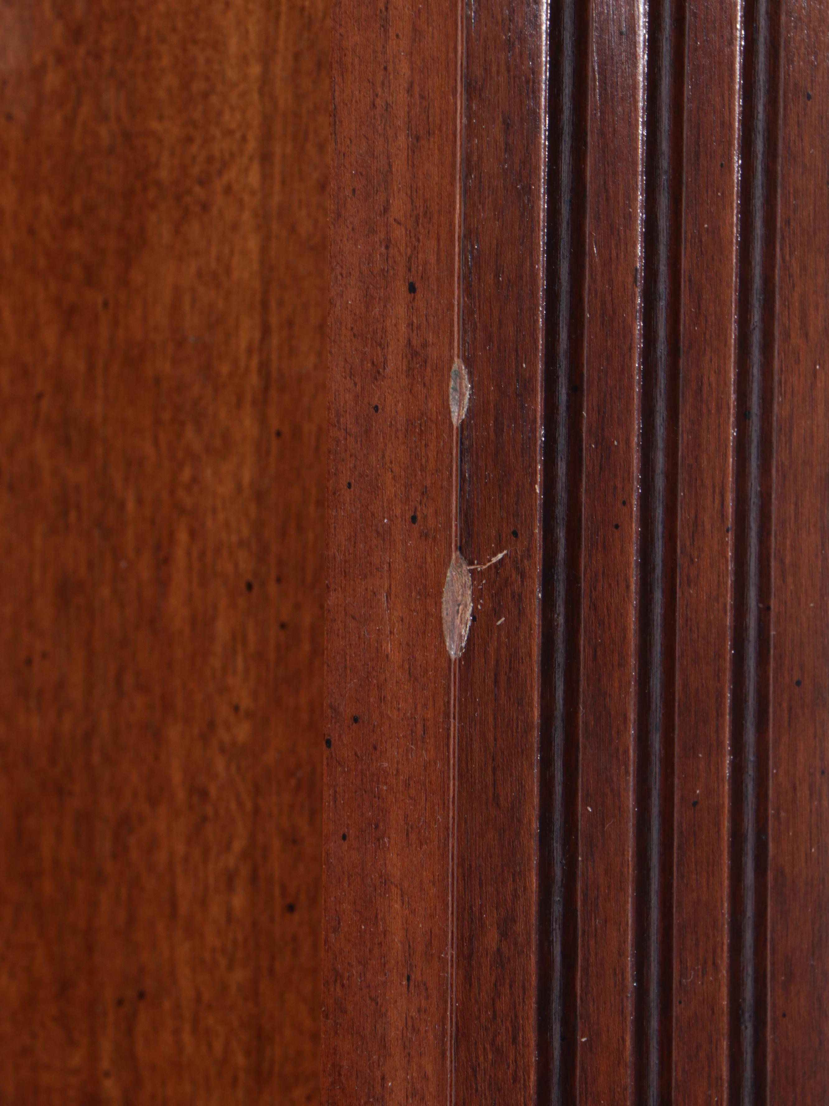Walnut Finished Corner Bookcase with Scalloped Bonnet