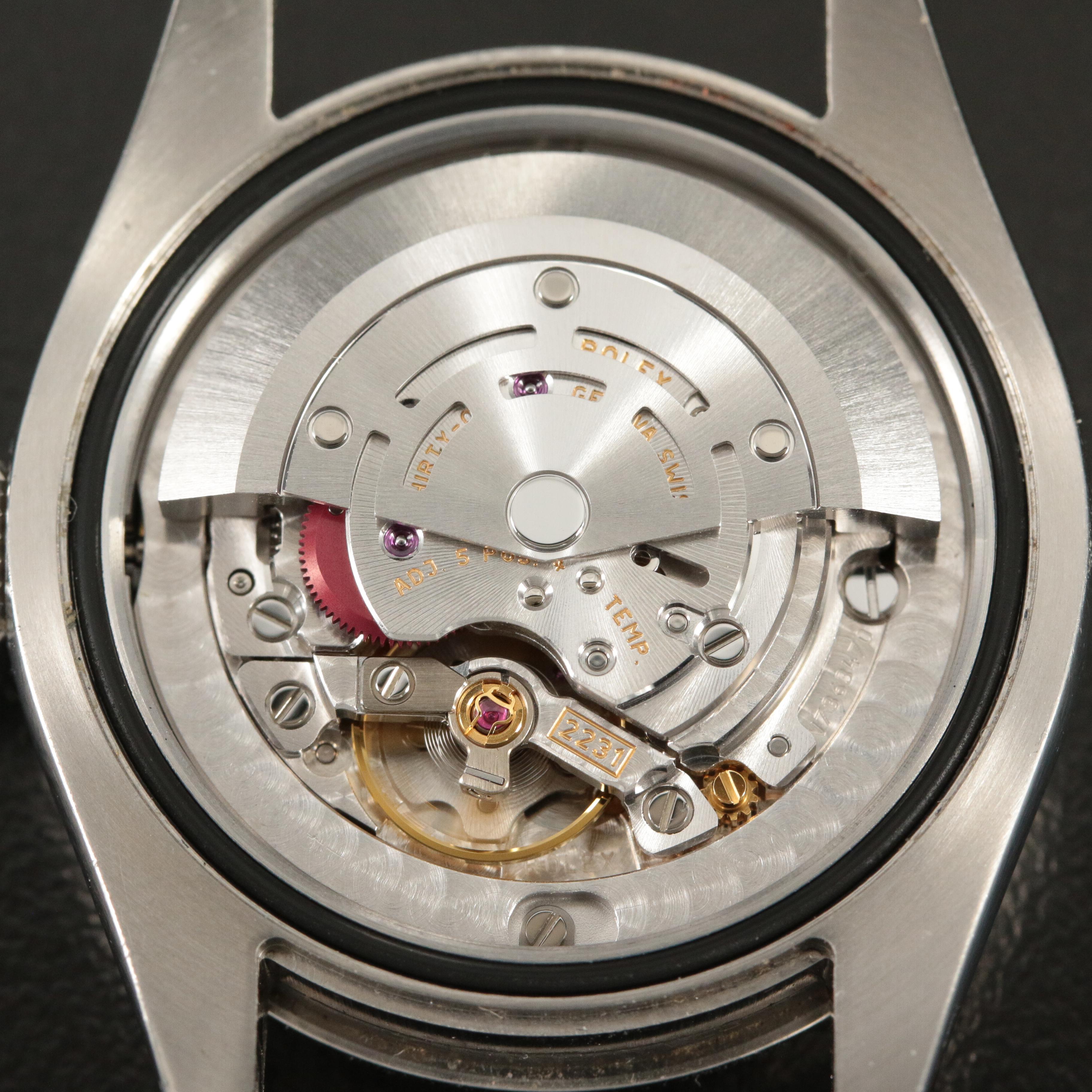 Rolex Oyster Perpetual 31MM Red Grape Roman Dial Watch