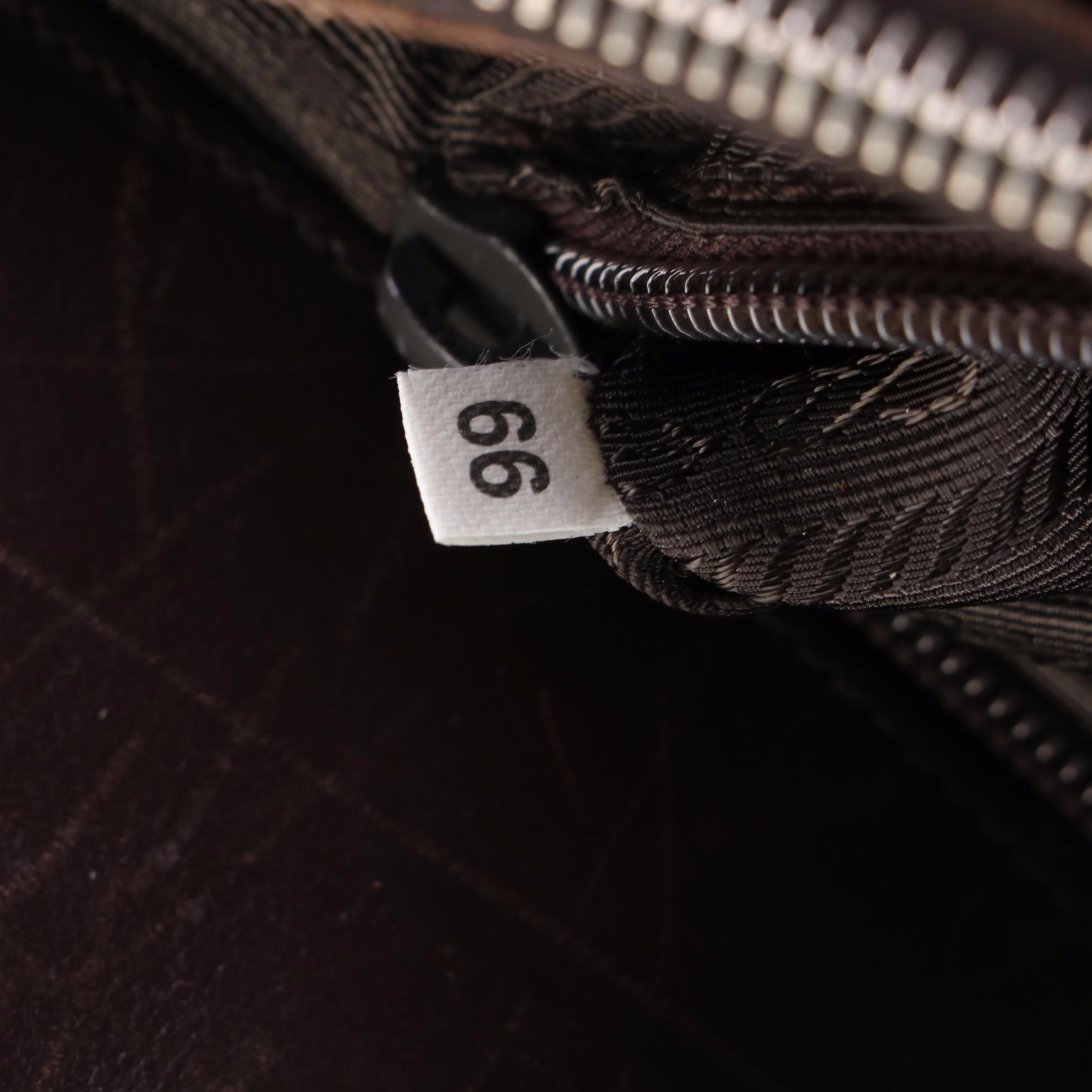 Prada Handbag in Woven Canvas and Leather