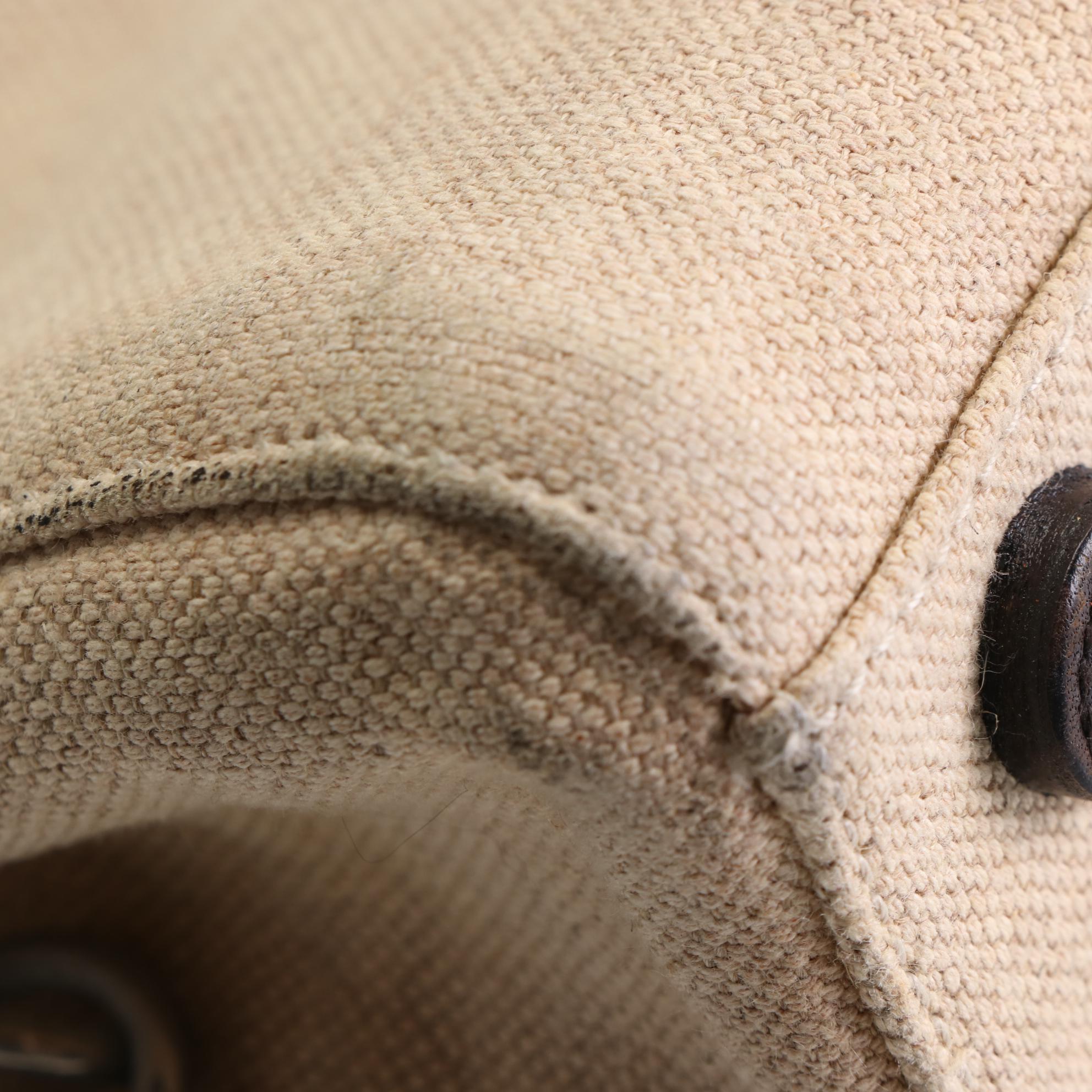 Prada Handbag in Woven Canvas and Leather