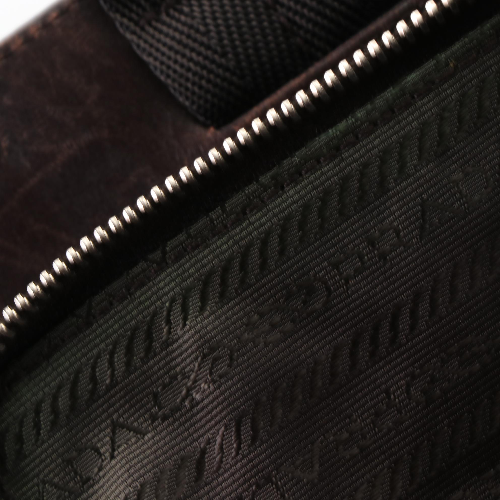 Prada Handbag in Woven Canvas and Leather