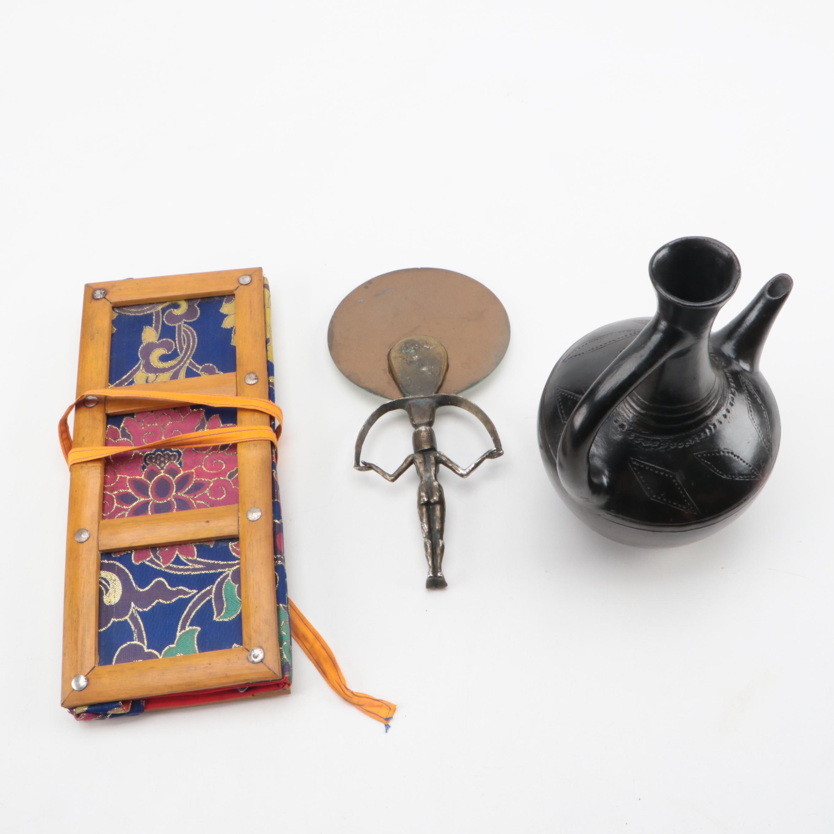 Ethiopian Ceramic Jebena with Embroidered Fabric Tibetan Pecha and Mirror