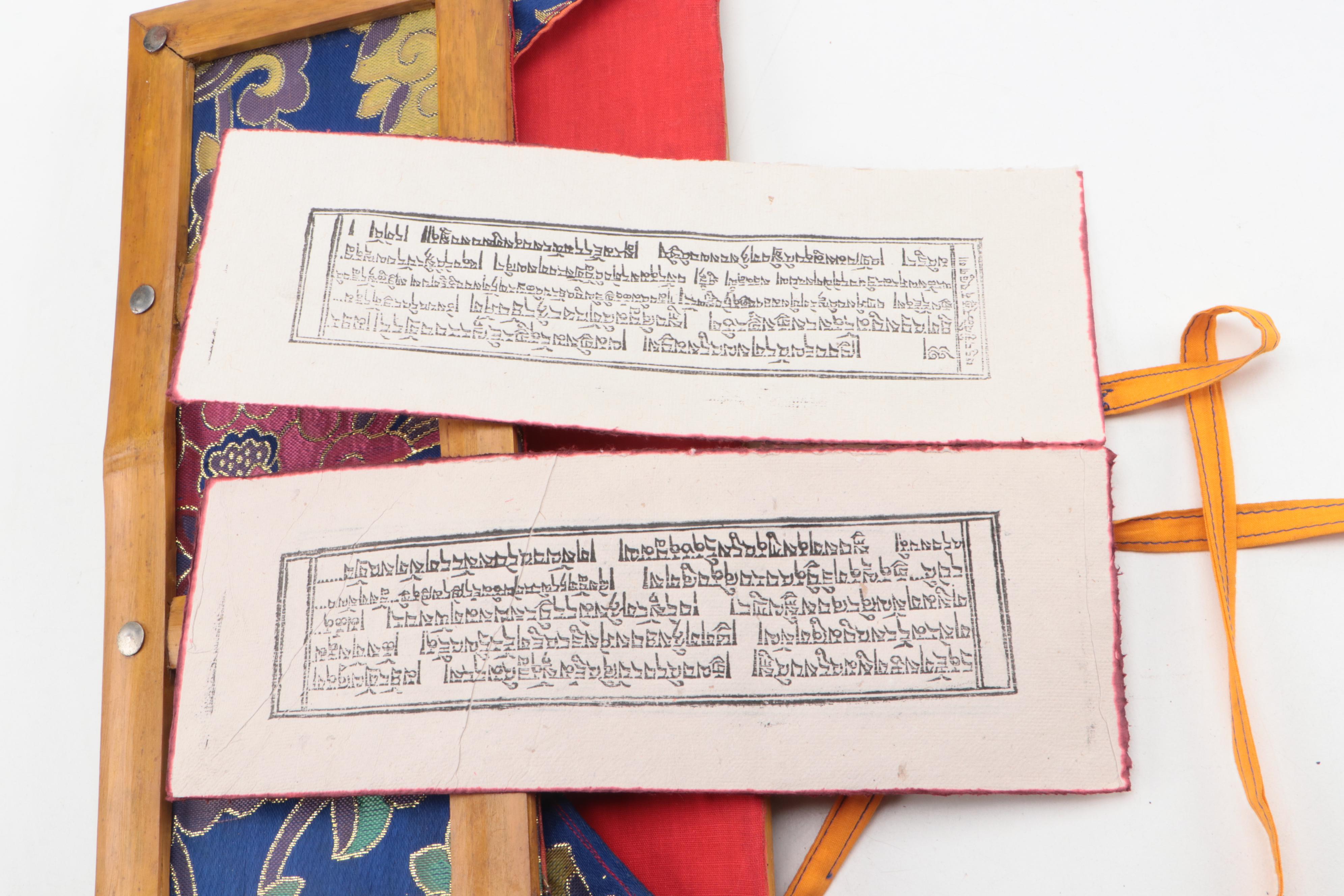 Ethiopian Ceramic Jebena with Embroidered Fabric Tibetan Pecha and Mirror