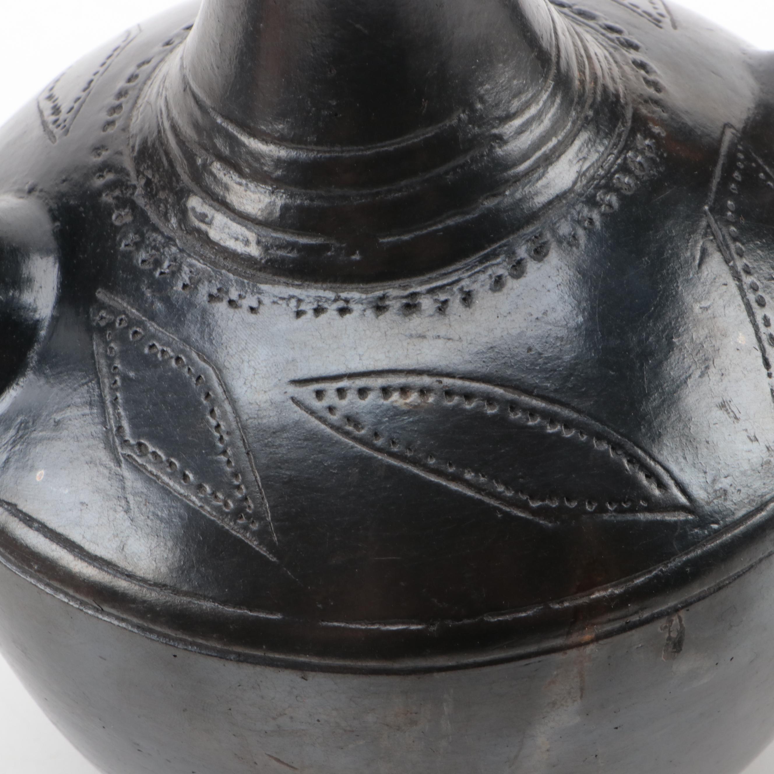 Ethiopian Ceramic Jebena with Embroidered Fabric Tibetan Pecha and Mirror