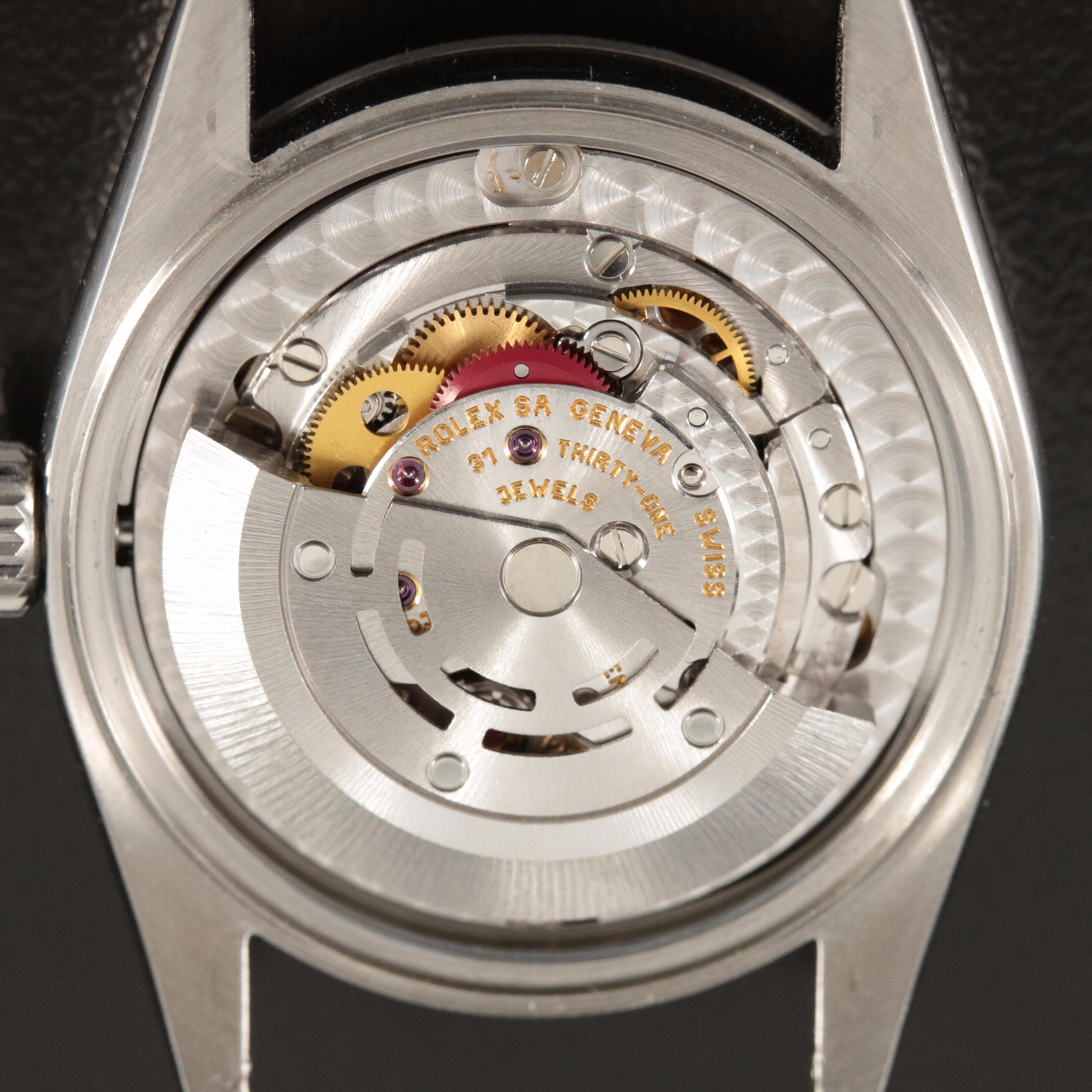 1999 Rolex Oyster Perpetual White Roman Dial Watch