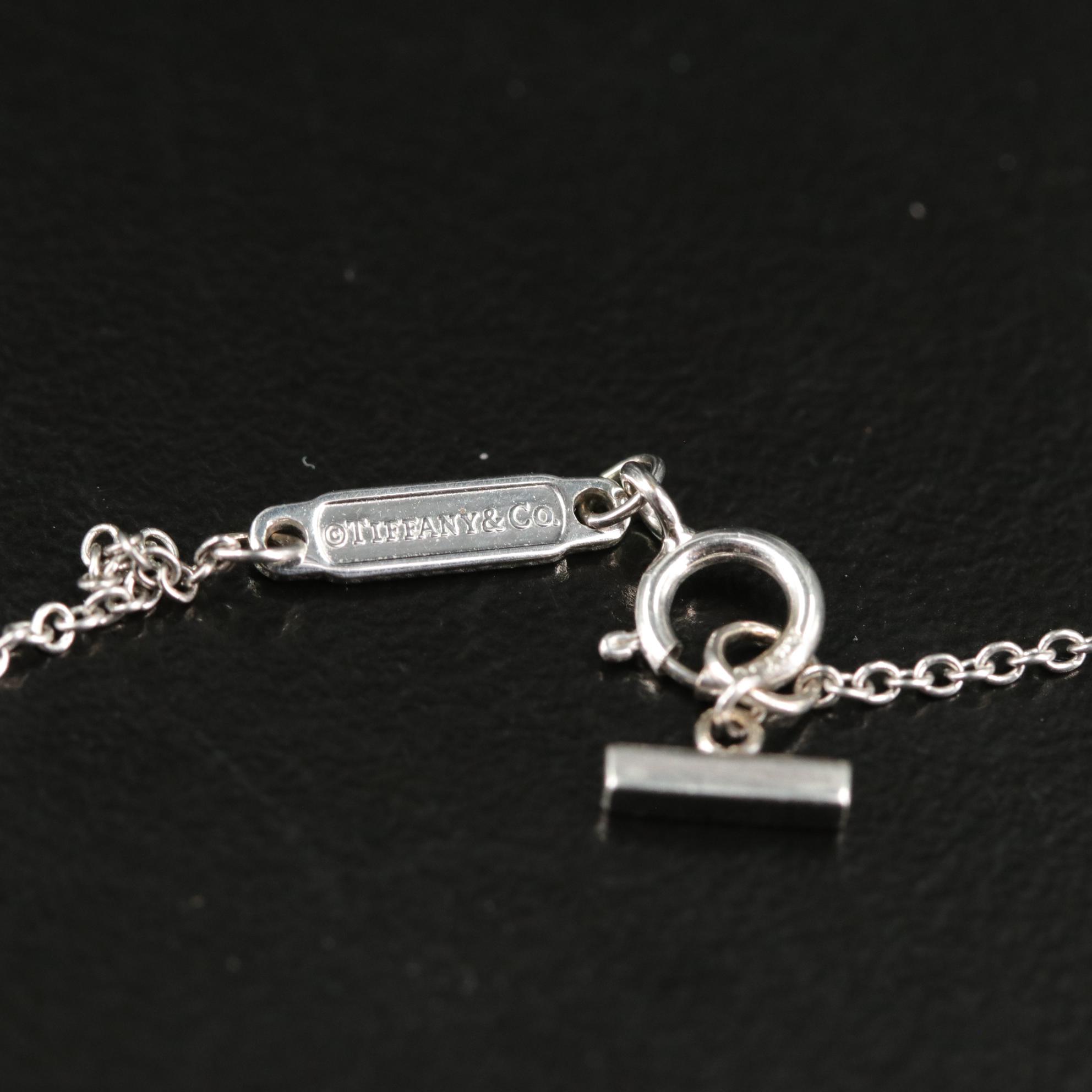 Tiffany & Co. 18K T Smile Blue Topaz Mini Pendant Necklace