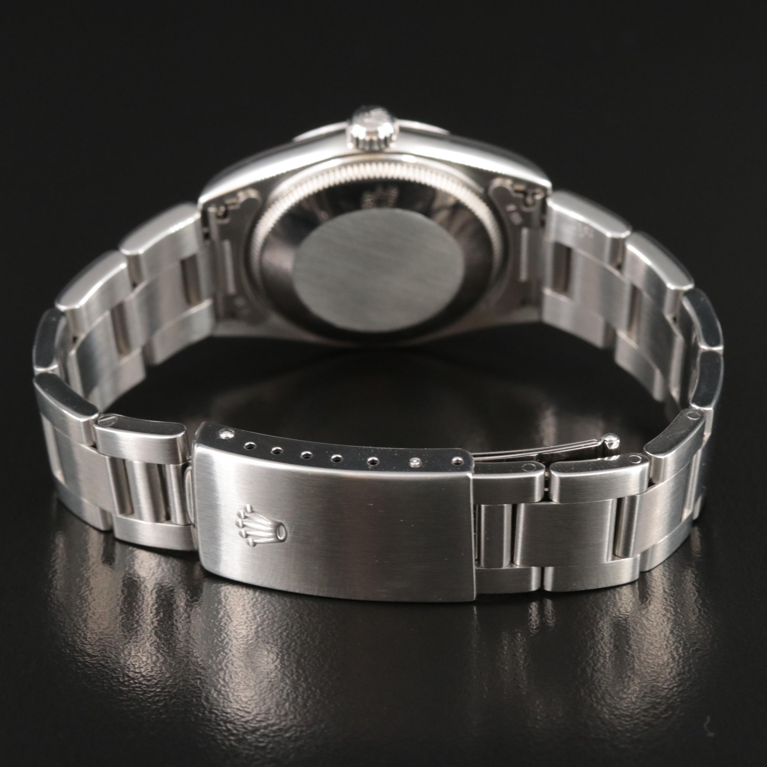 1999 Rolex Oyster Perpetual White Roman Dial Watch