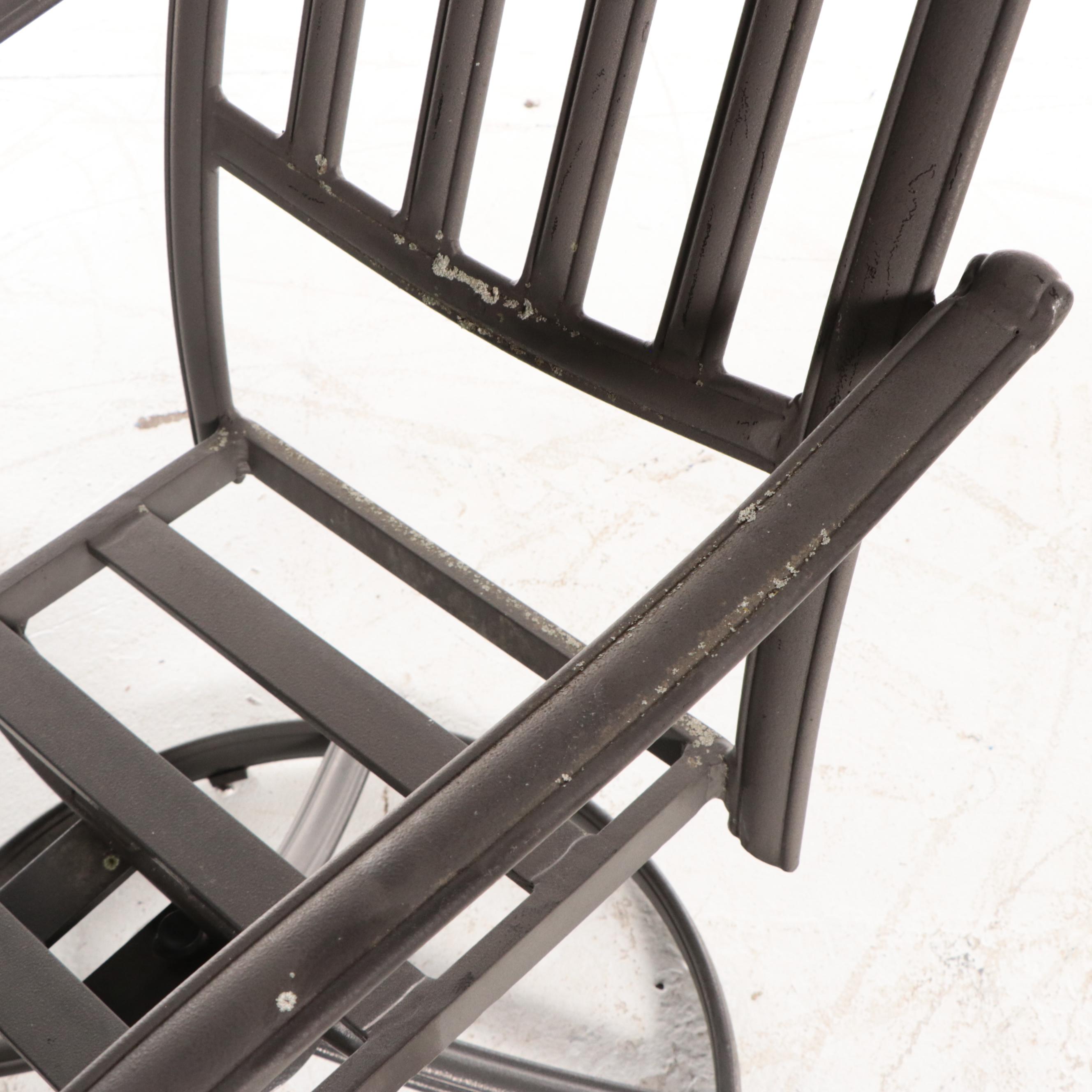 Tiled Metal Patio Dining Table With Swivel Captain's Chairs and Armchairs