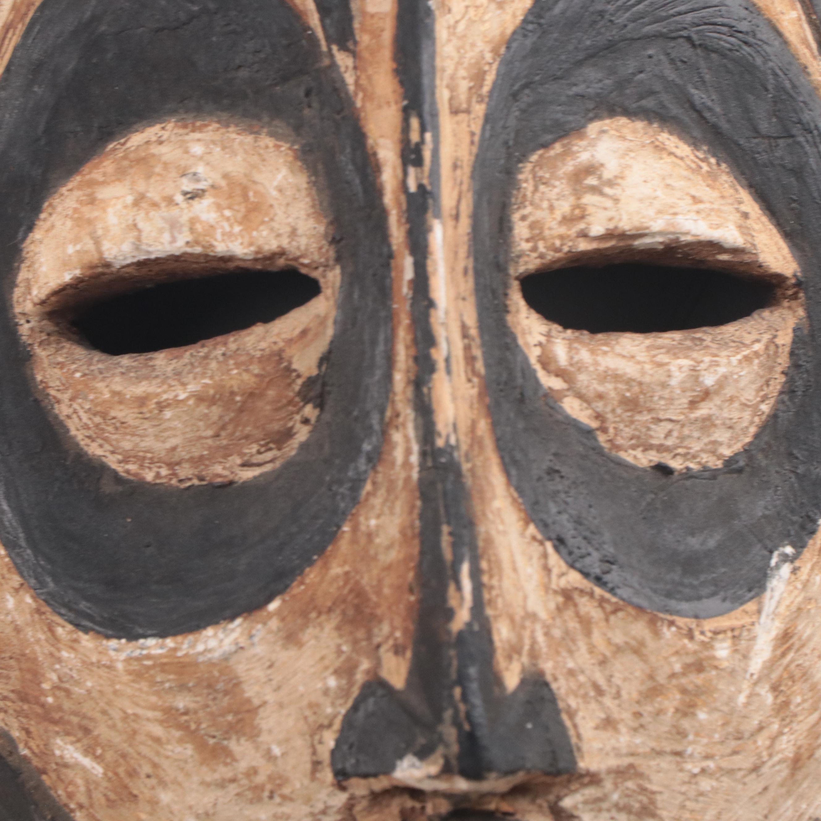 African and Guatemalan Carved Wood Masks, Late 20th Century