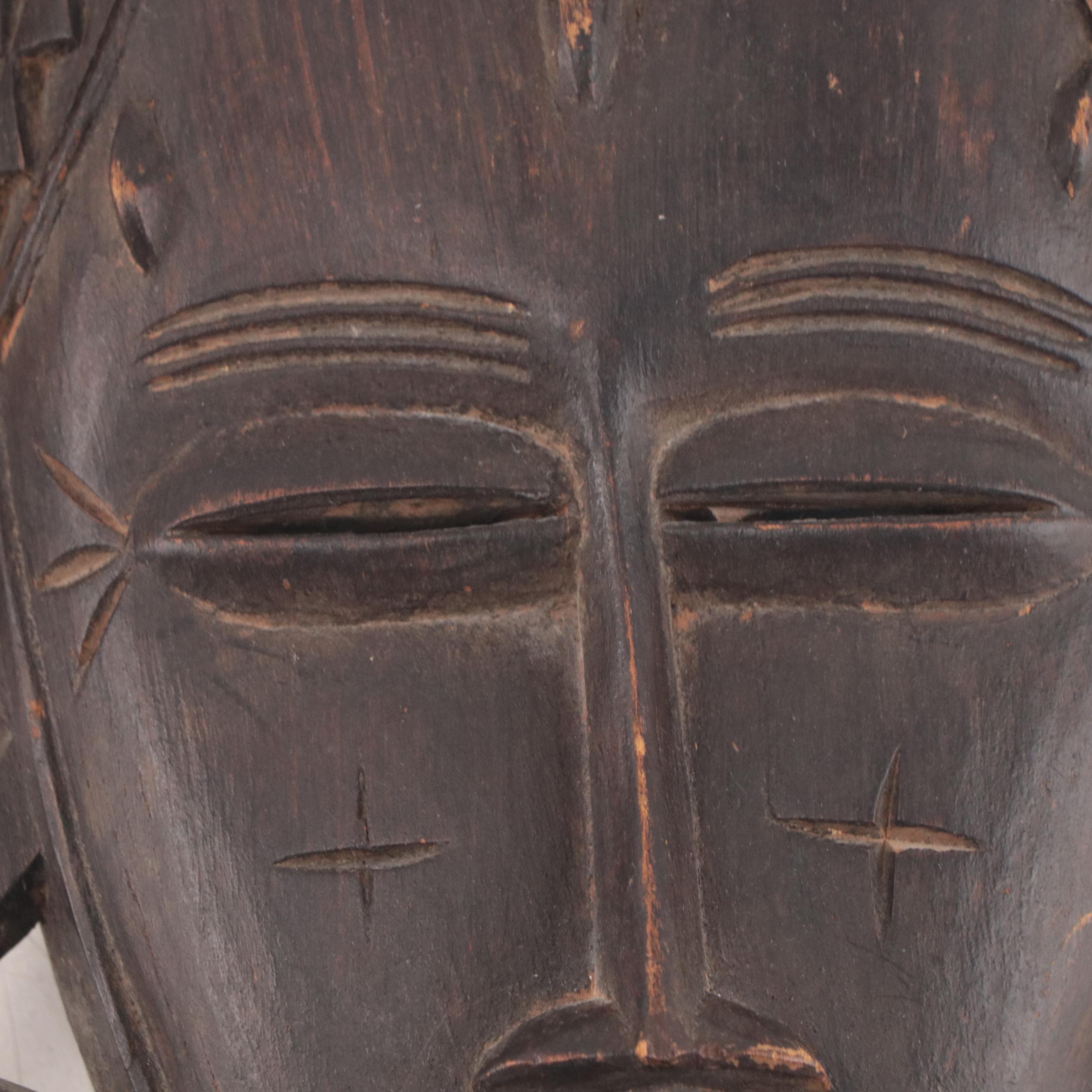 African and Guatemalan Carved Wood Masks, Late 20th Century