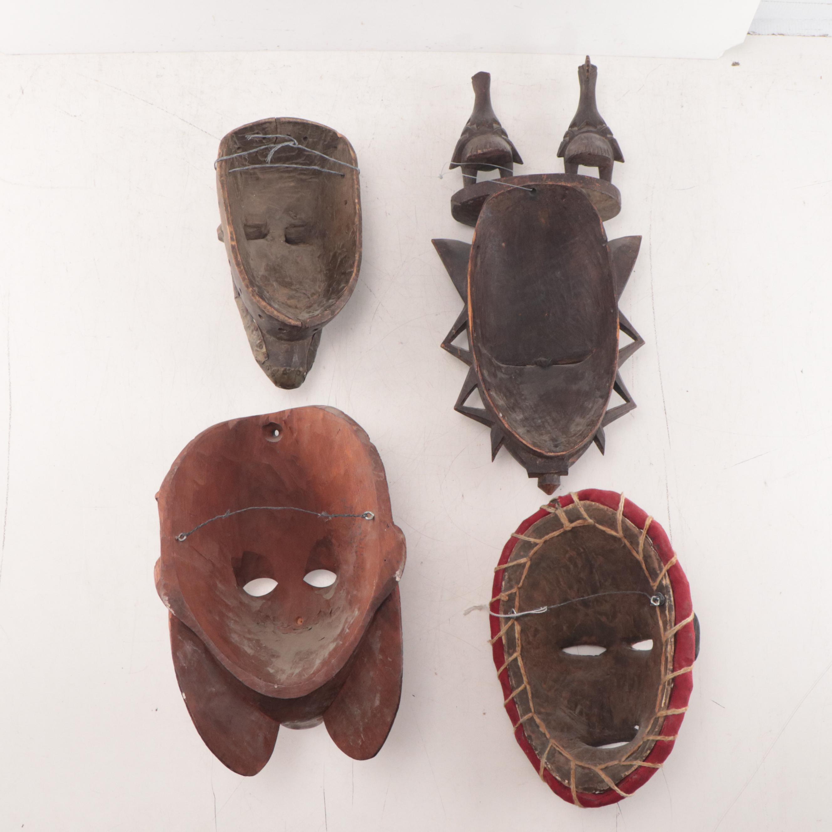 African and Guatemalan Carved Wood Masks, Late 20th Century