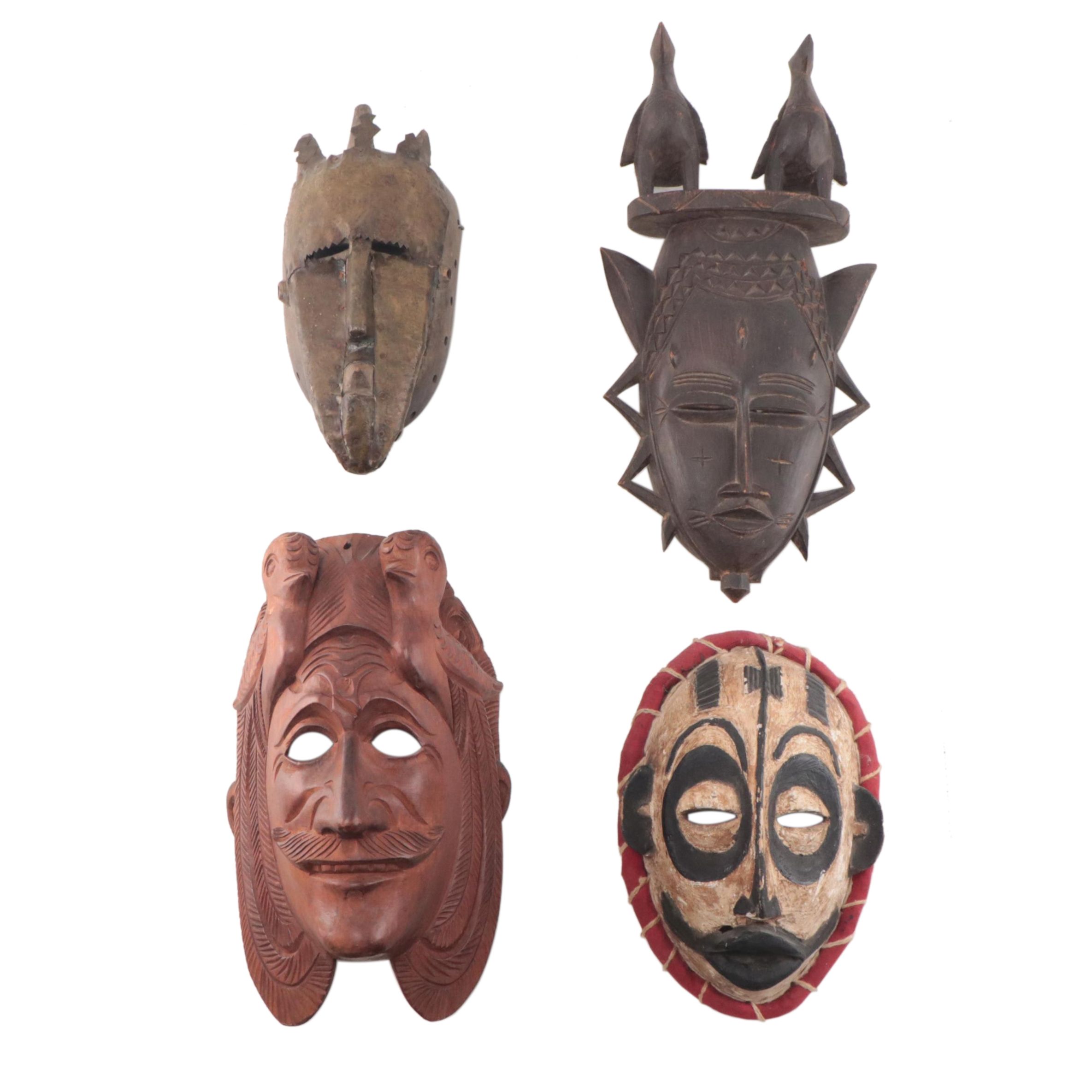 African and Guatemalan Carved Wood Masks, Late 20th Century