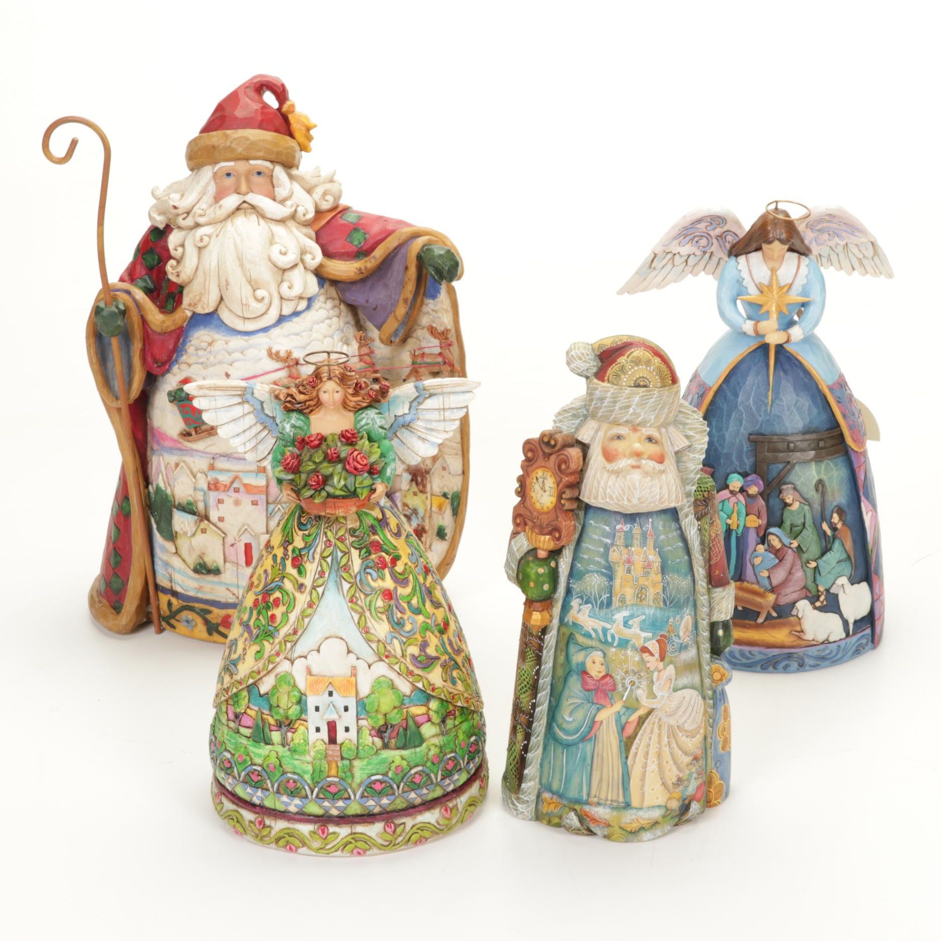 Jim Shore and G. DeBrekht Disney Santa Claus Figurines