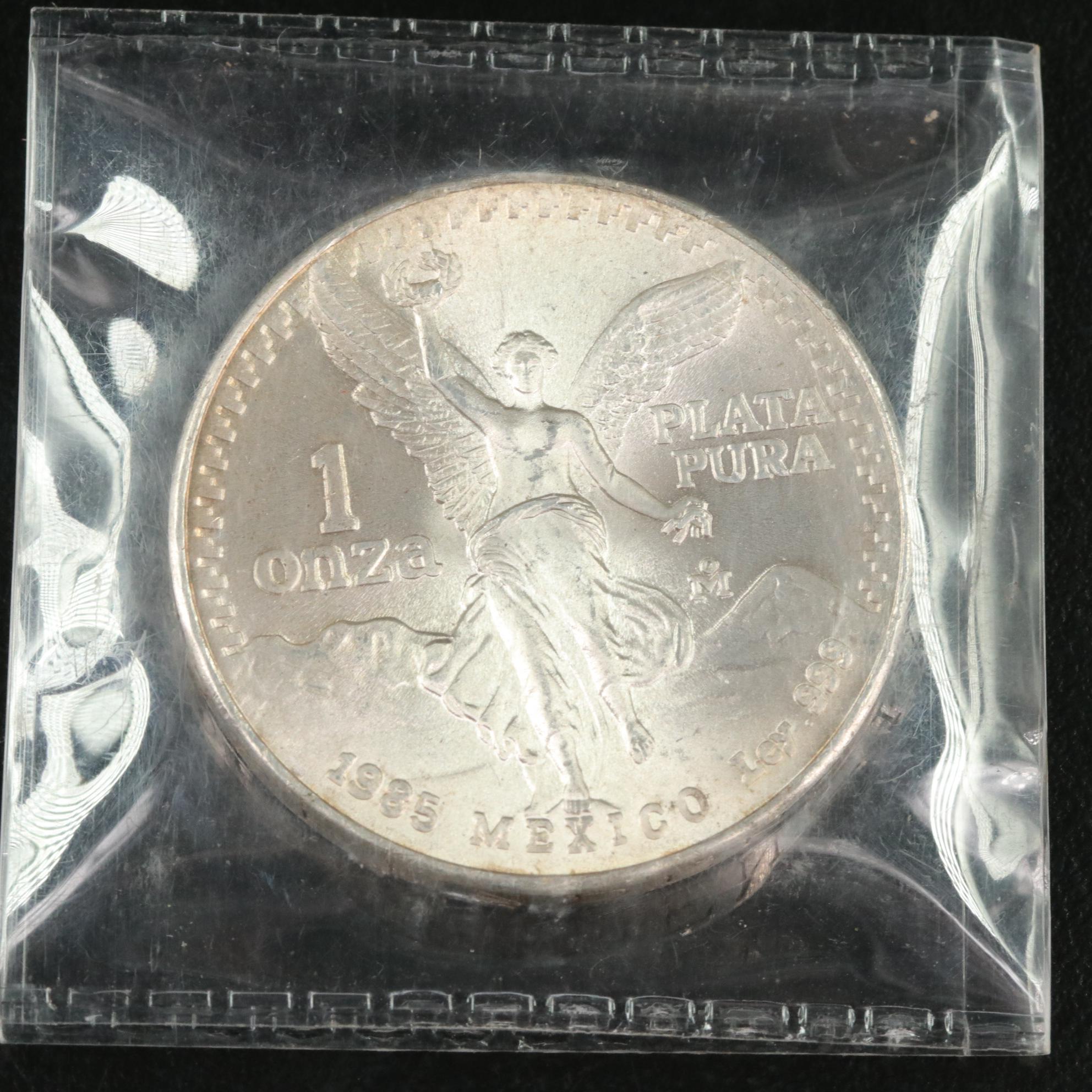 Two 2 ounce and a 1 Ounce Mexican .999 silver Coins