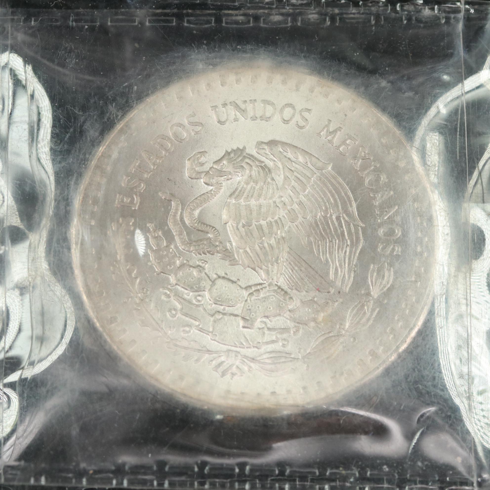 Two 2 ounce and a 1 Ounce Mexican .999 silver Coins