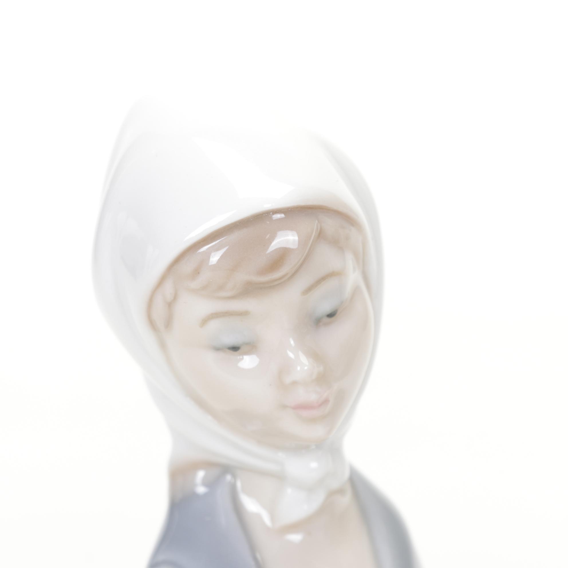 Lladro "Girl with Lilies", "Shepherdess", "Naughty Girl" & "Girl with Milk Pail"