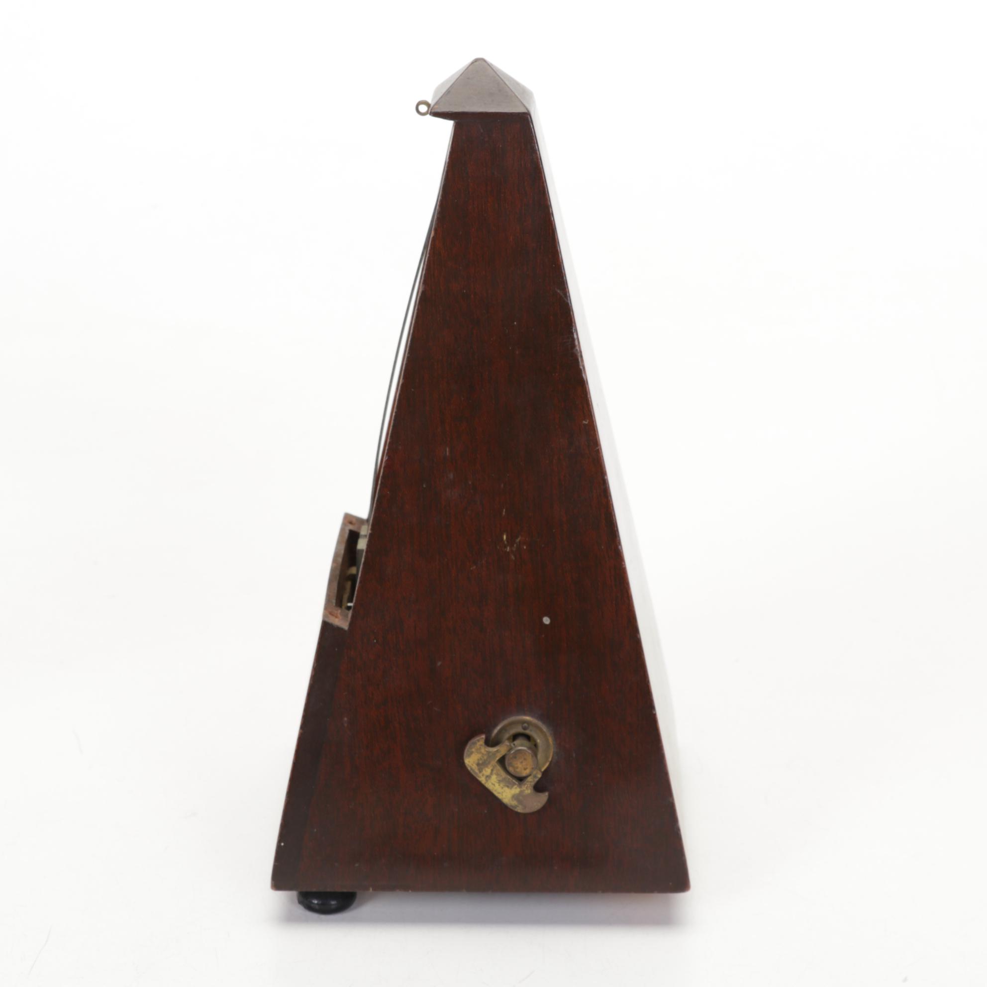 Metronome De Maelzel No 309, with St Clair Paperweights and Other Décor