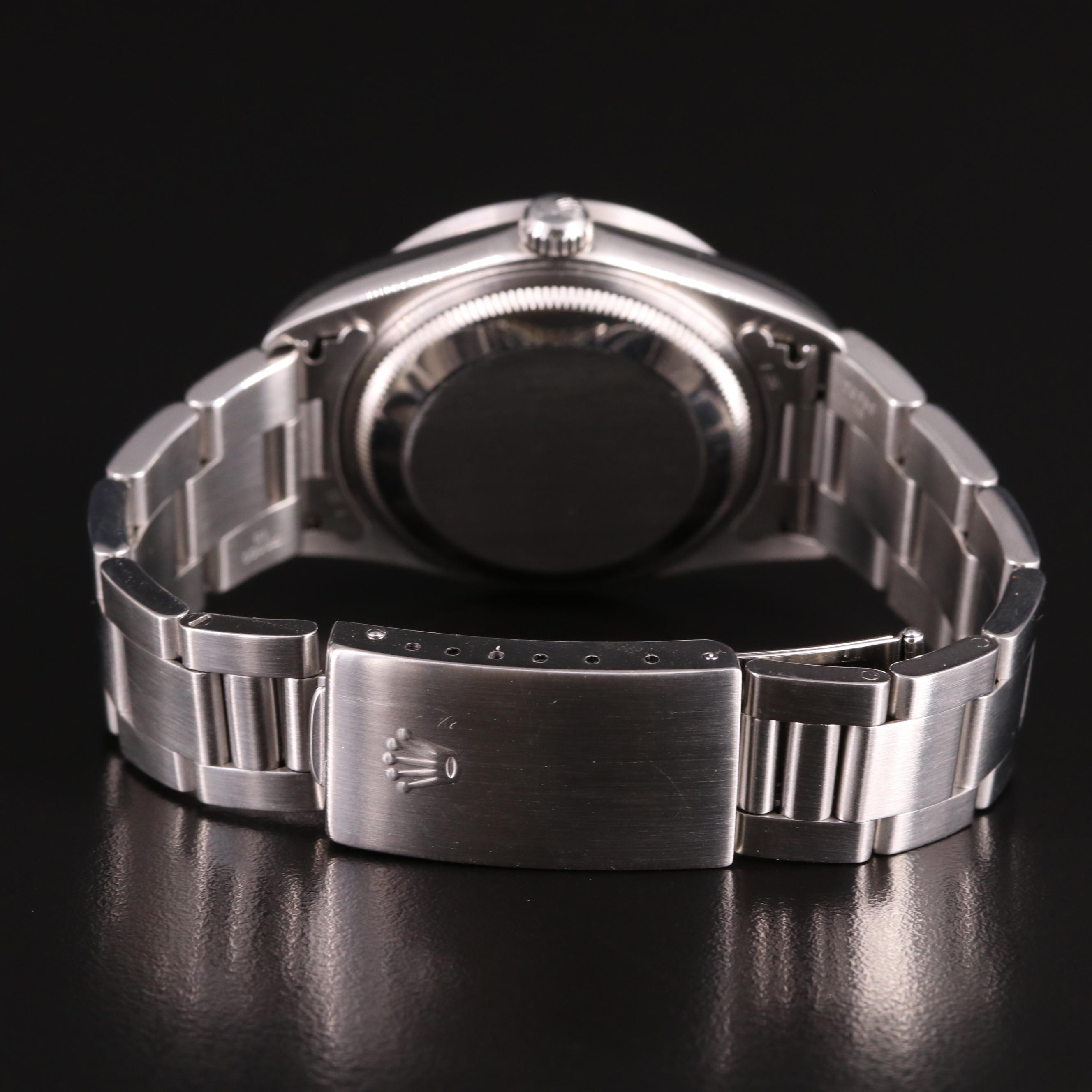 1995 Rolex Oyster Perpetual Date Blue Dial Watch