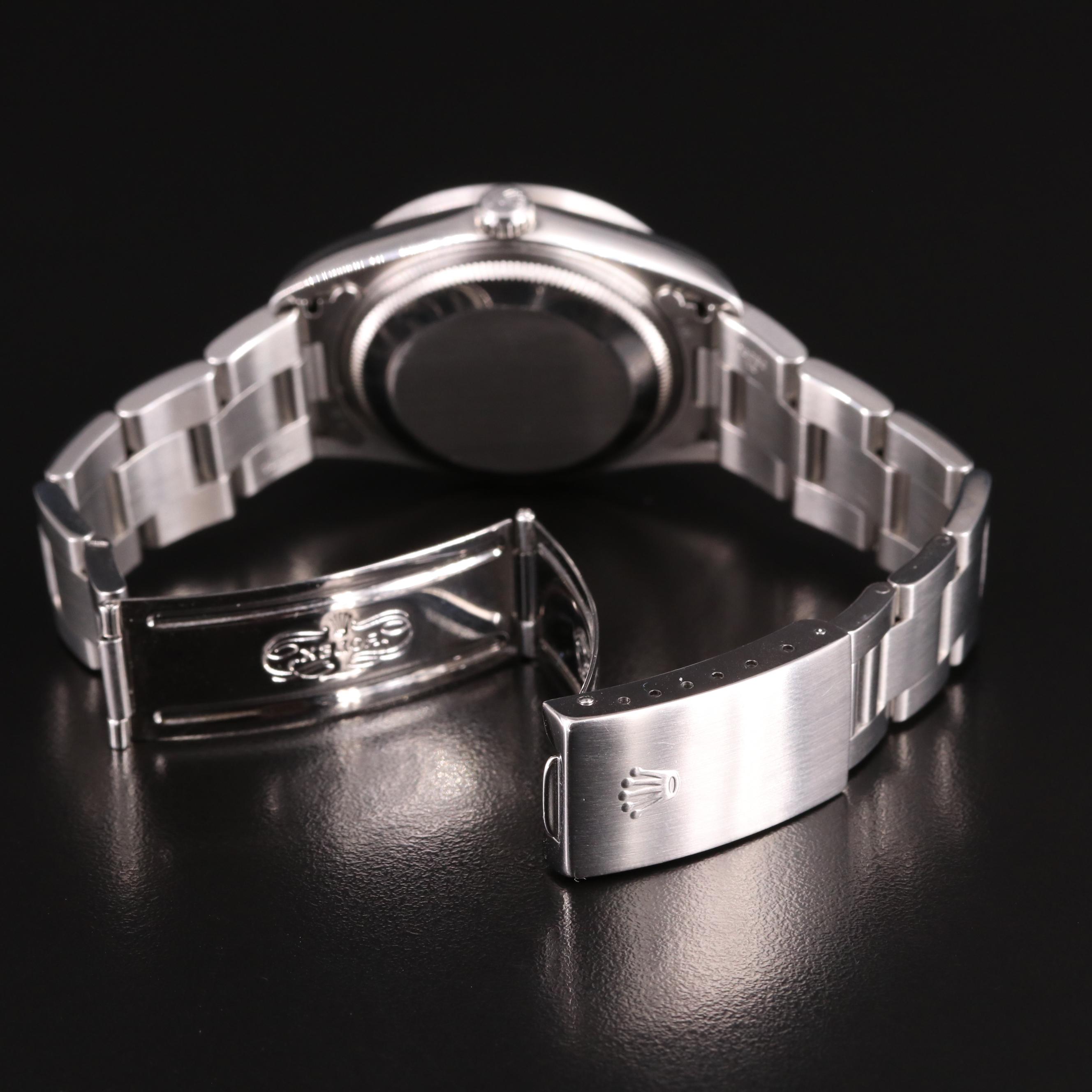 1995 Rolex Oyster Perpetual Date Blue Dial Watch