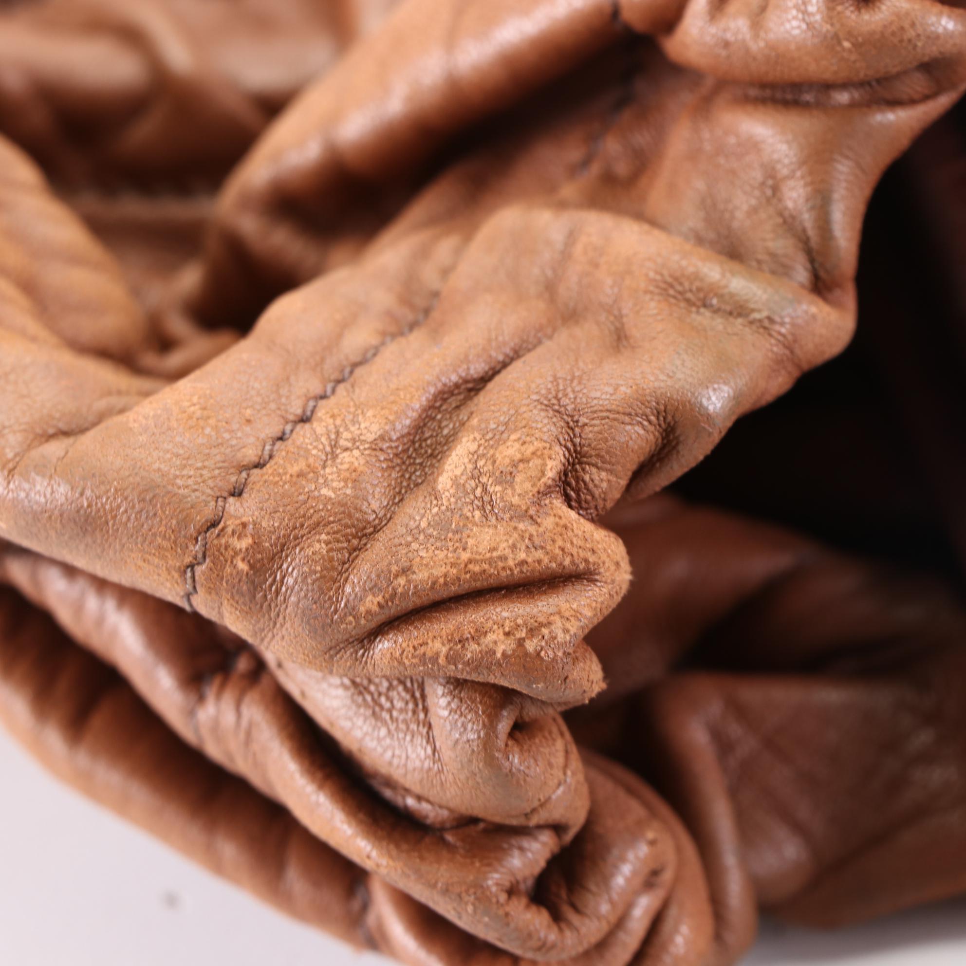 Prada Drawstring Shoulder Bag BN1757 in Antique Nappa Leather