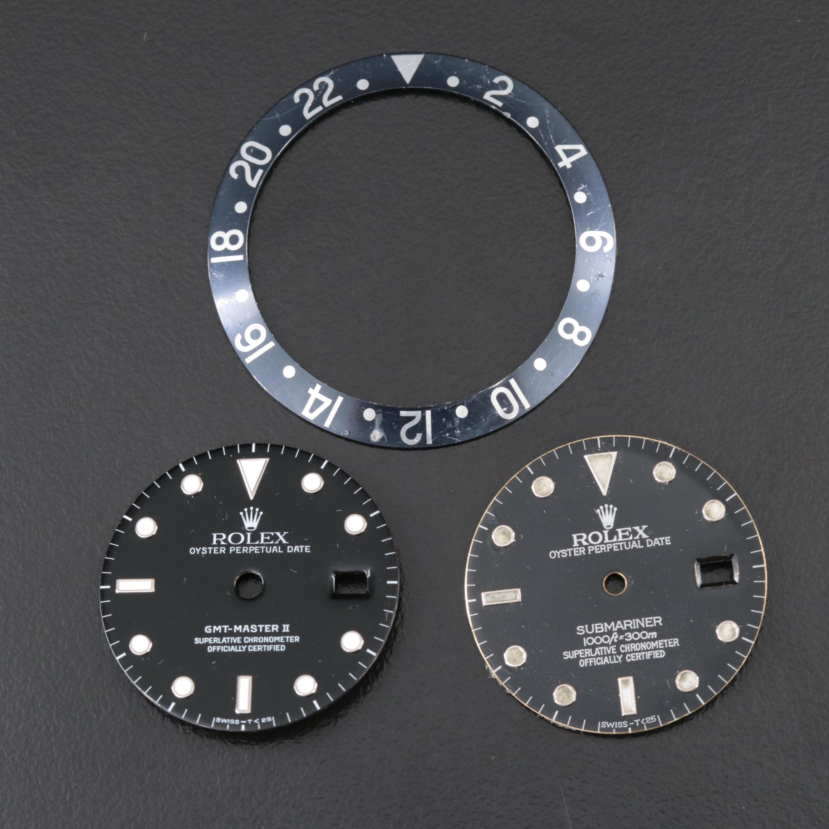 Two Rolex Dials and a Bezel Insert