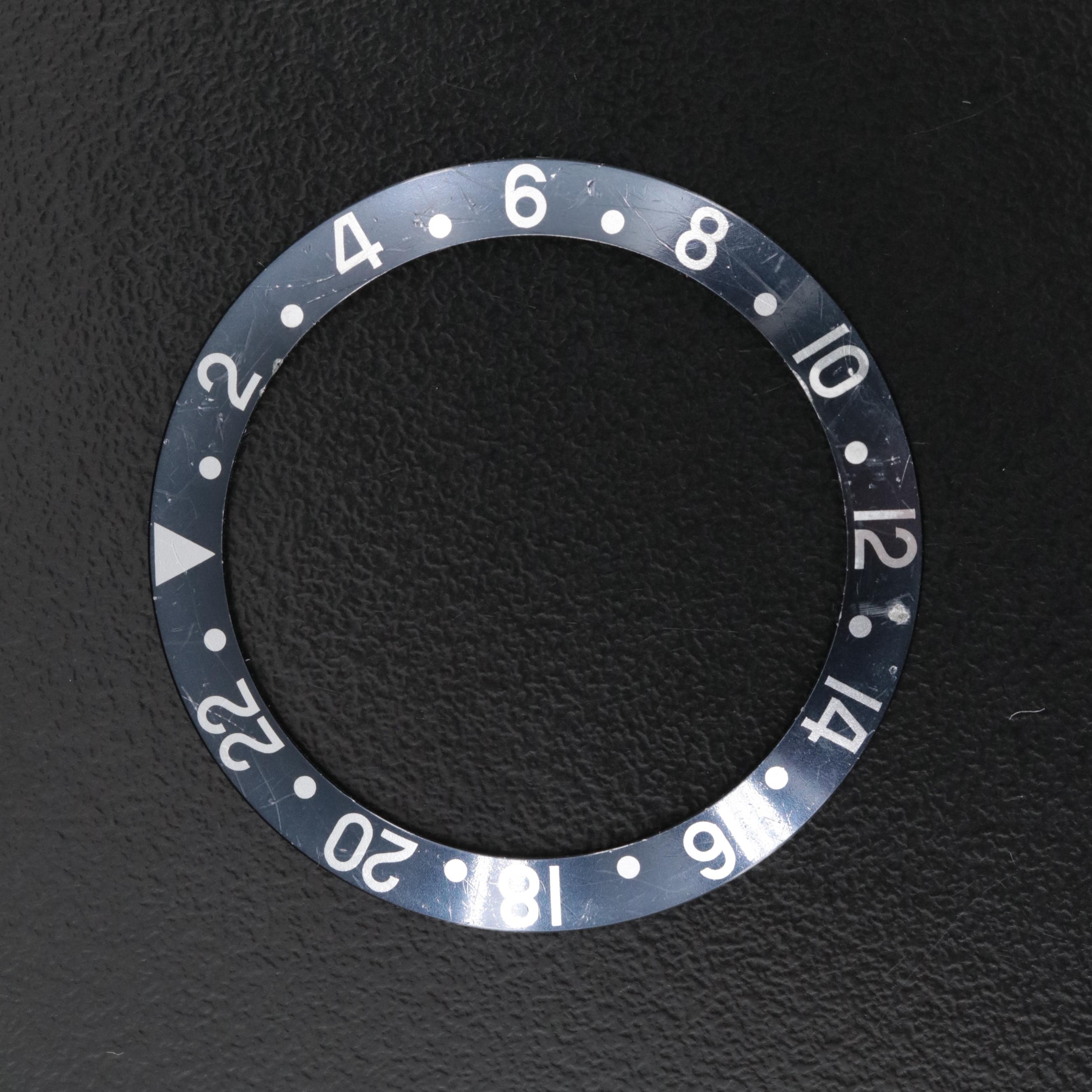 Two Rolex Dials and a Bezel Insert